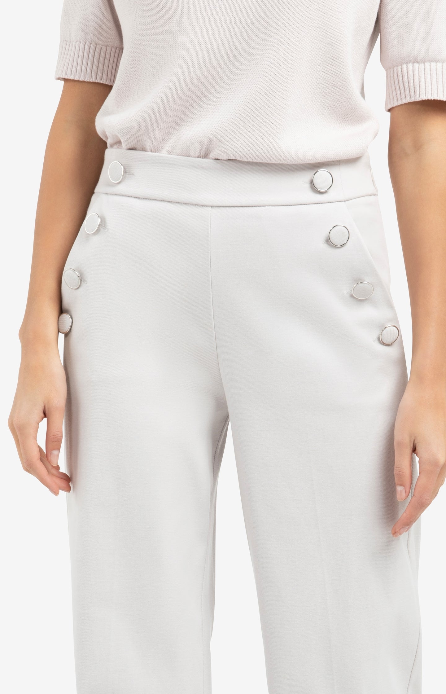 High waist trousers with decorative buttons and wide legs