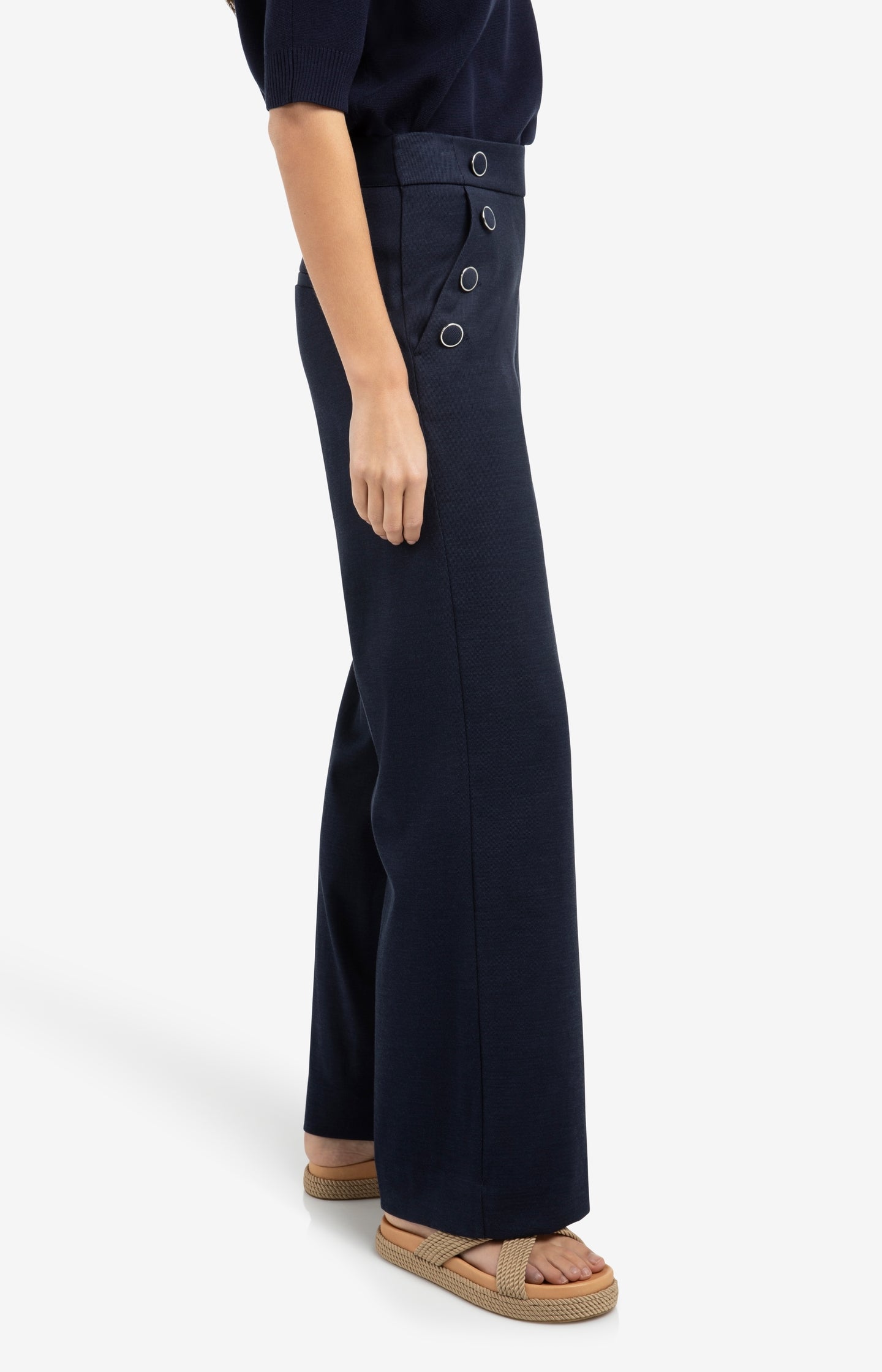 High waist trousers with decorative buttons and wide legs