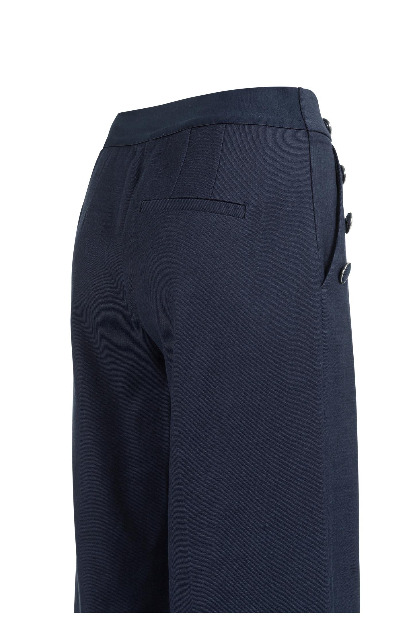 High waist trousers with decorative buttons and wide legs