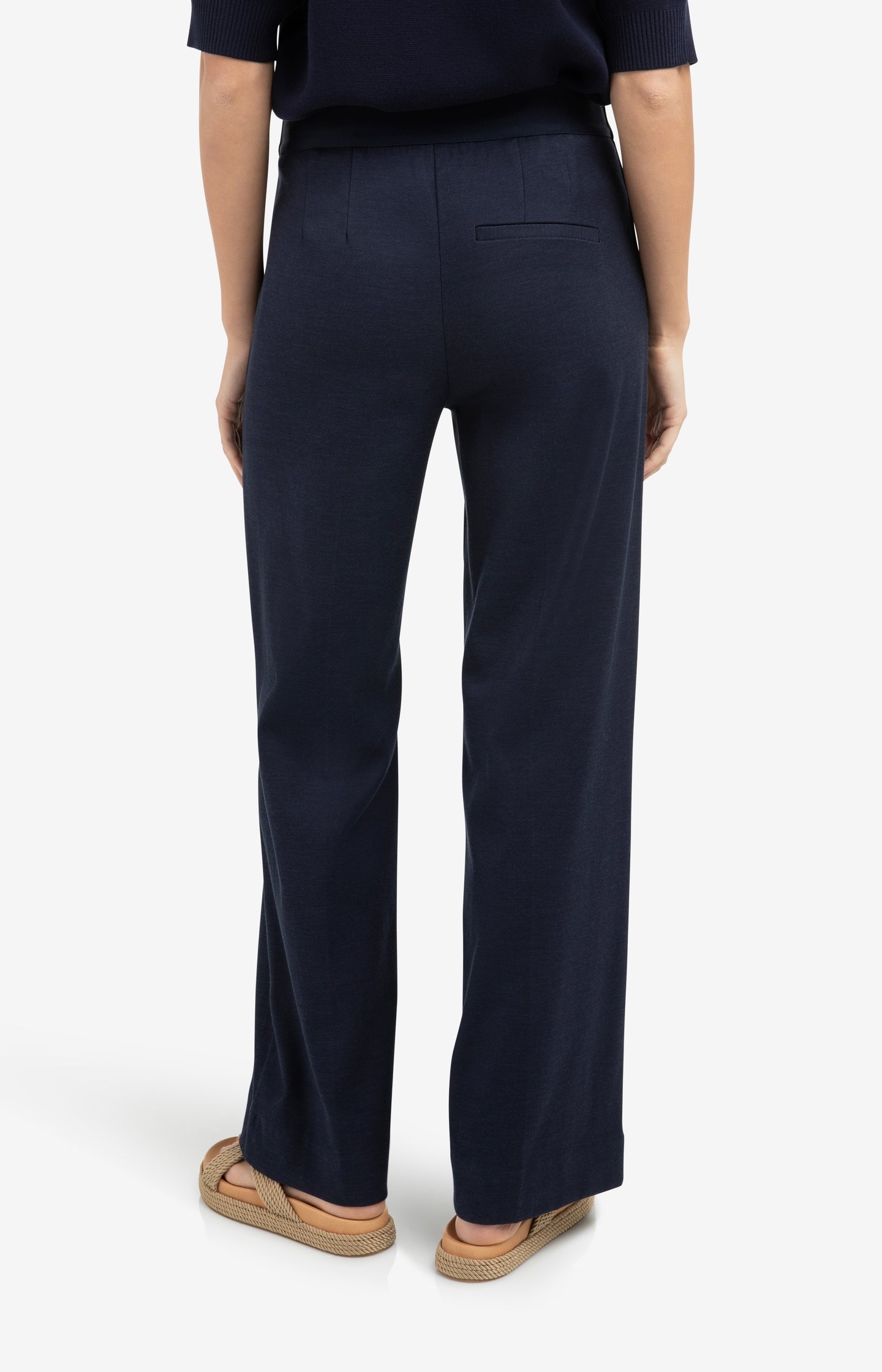 High waist trousers with decorative buttons and wide legs