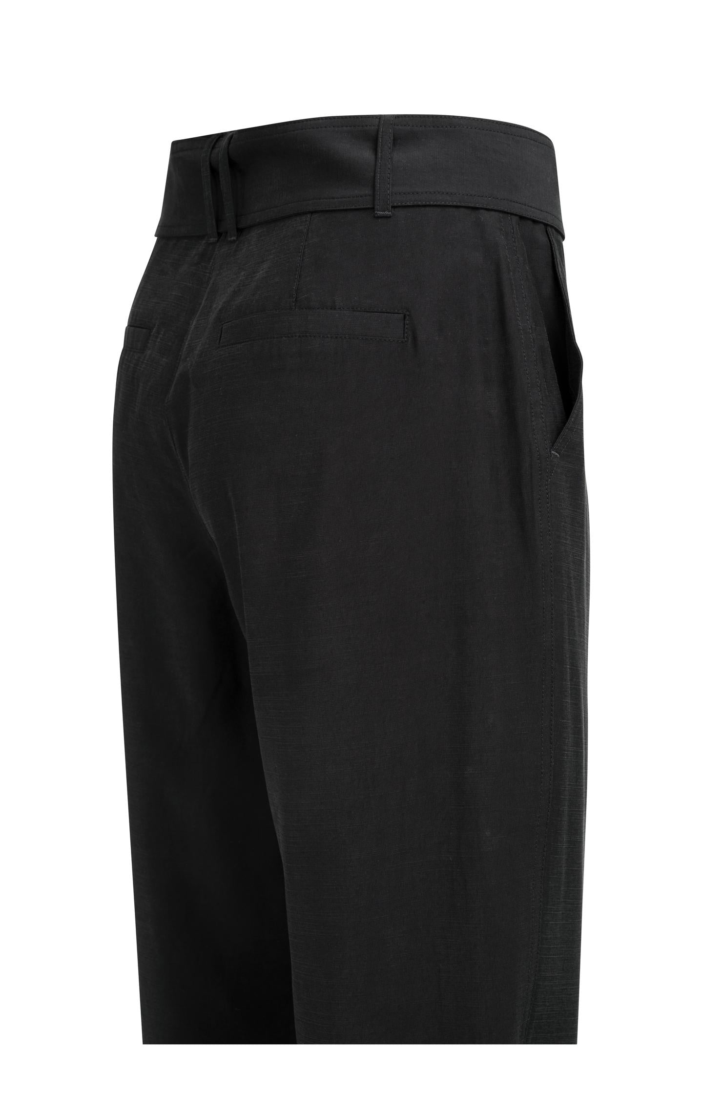 High waist trousers with strap details at the bottom hem
