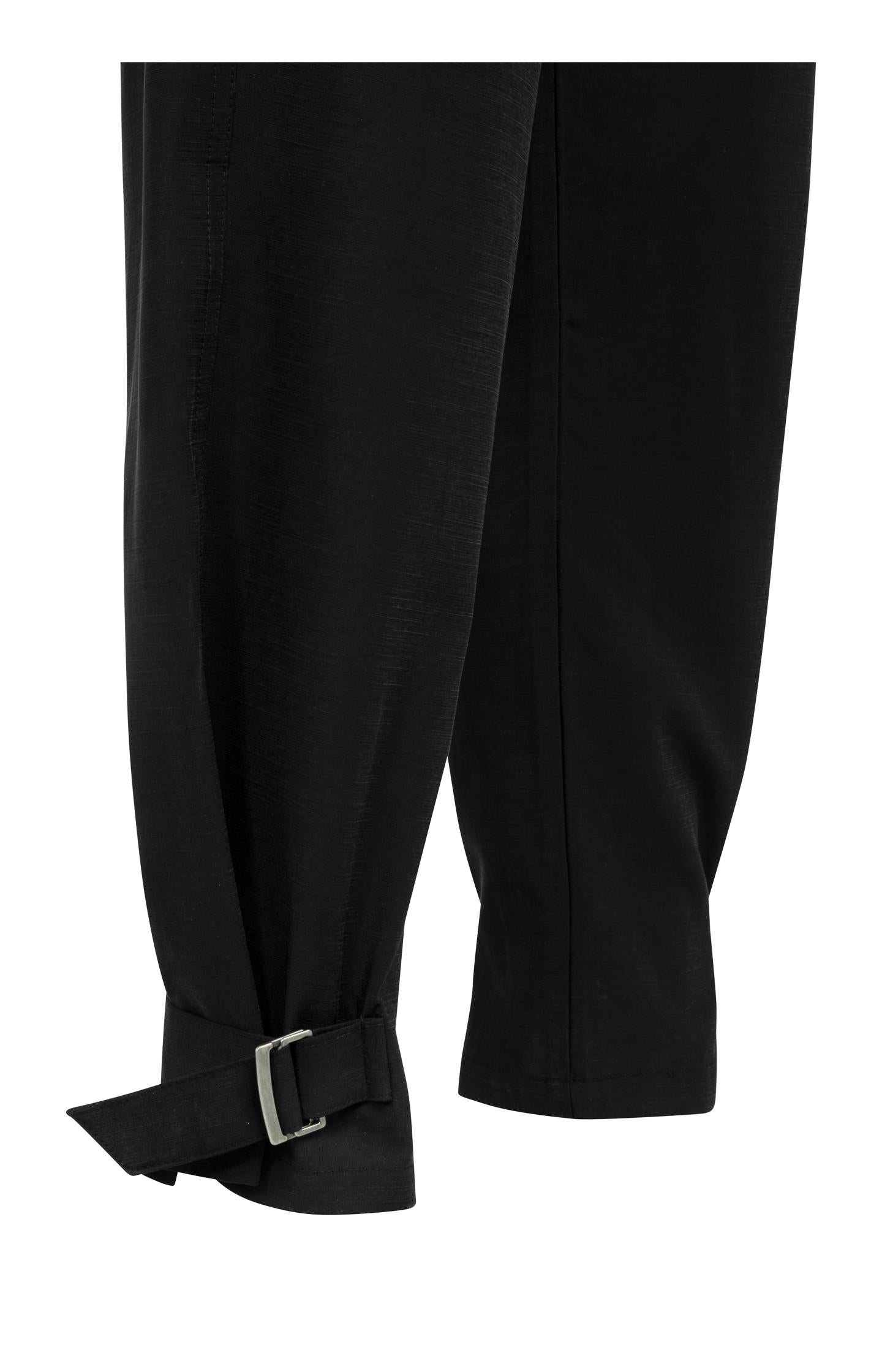 High waist trousers with strap details at the bottom hem