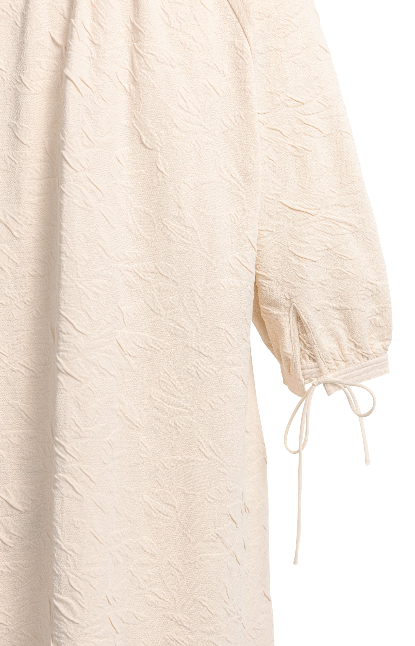 Jersey dress with texture and drawstring details