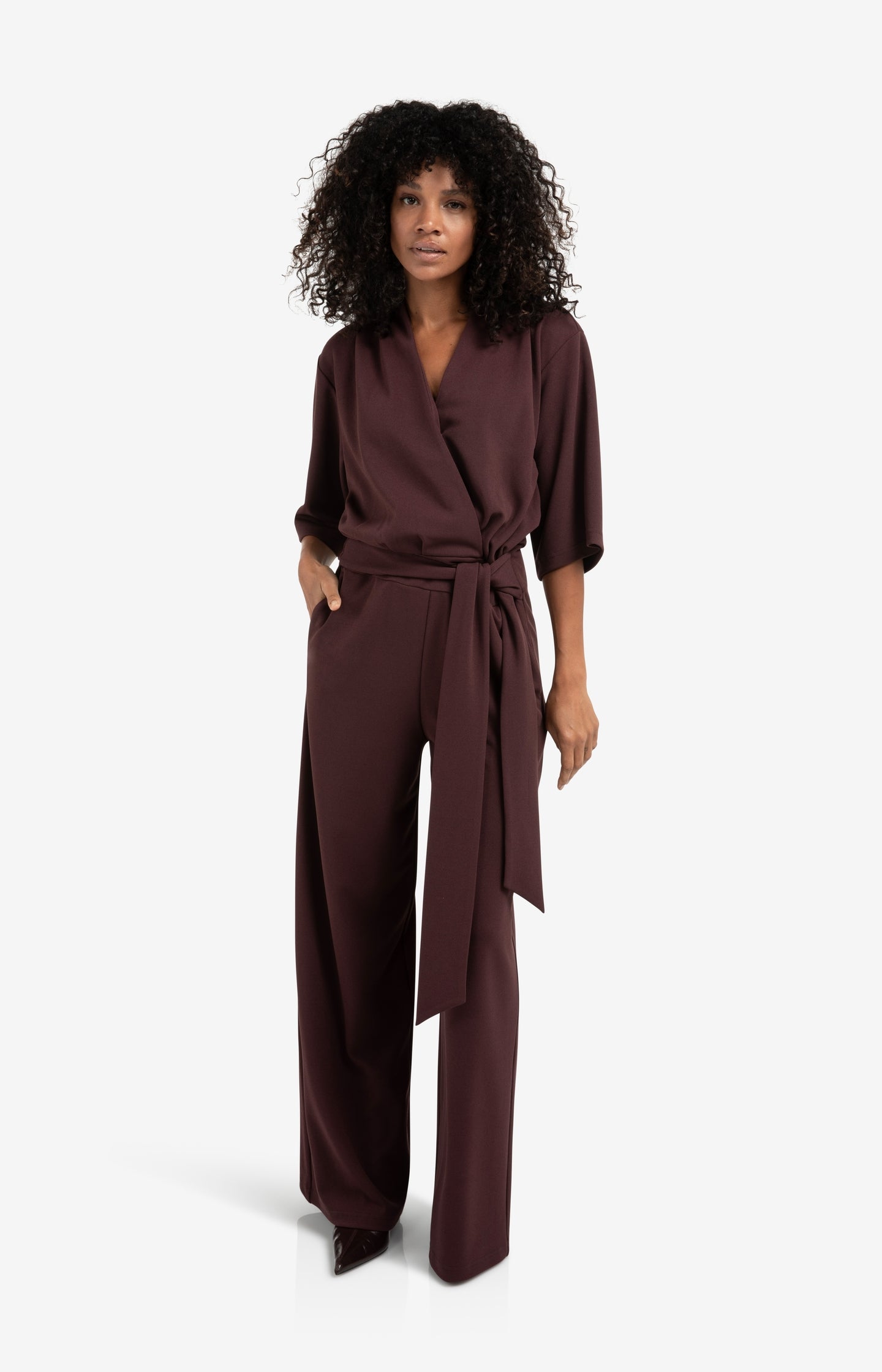 Jersey jumpsuit with short sleeves and tie belt