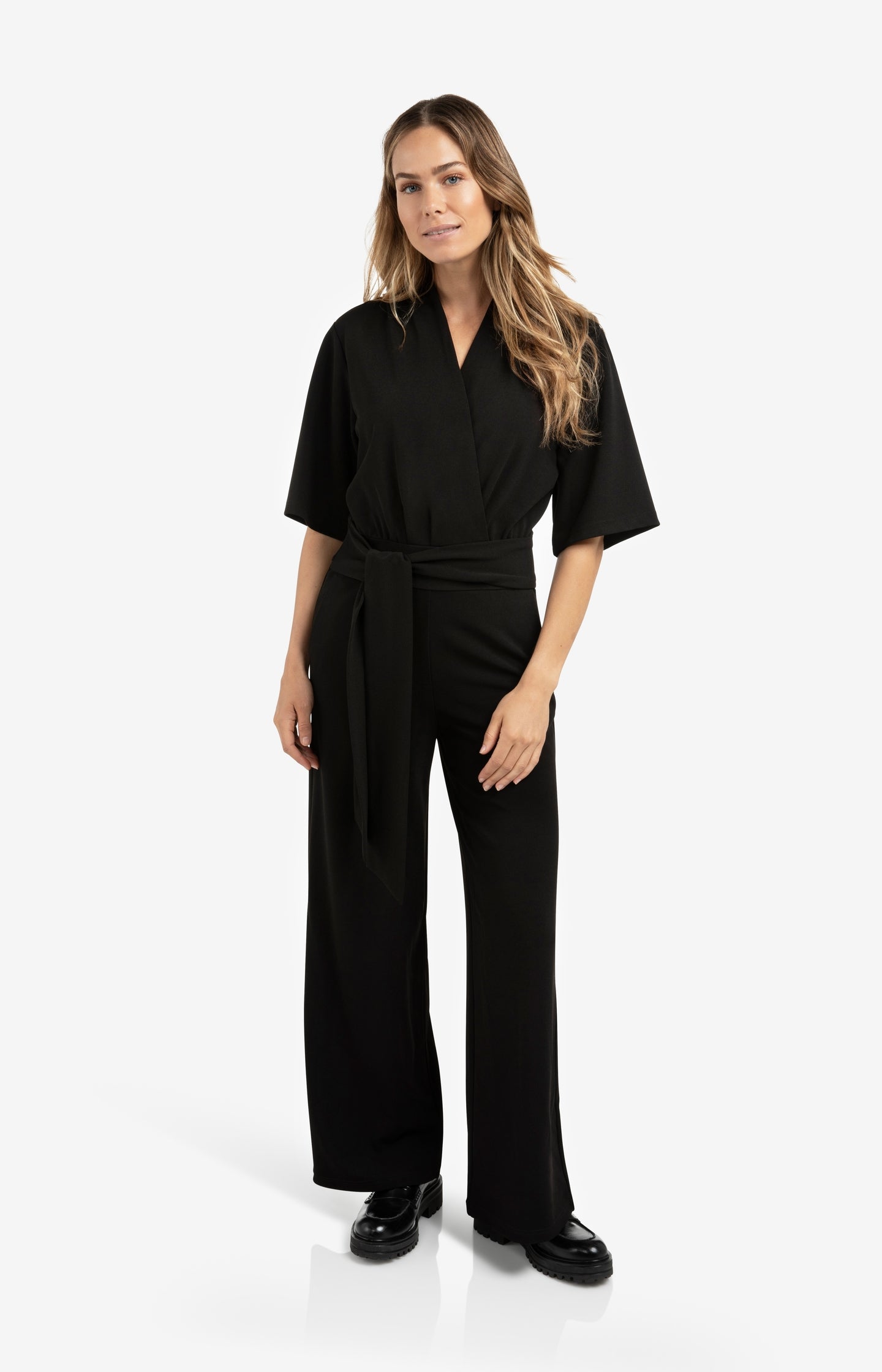 Jersey jumpsuit with short sleeves and tie belt