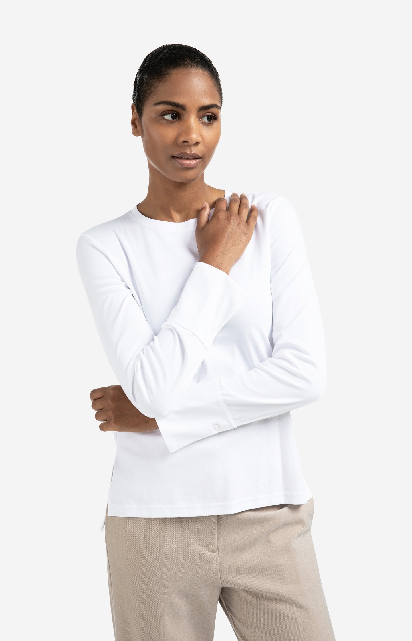 Jersey top with woven cuffs and slit detail