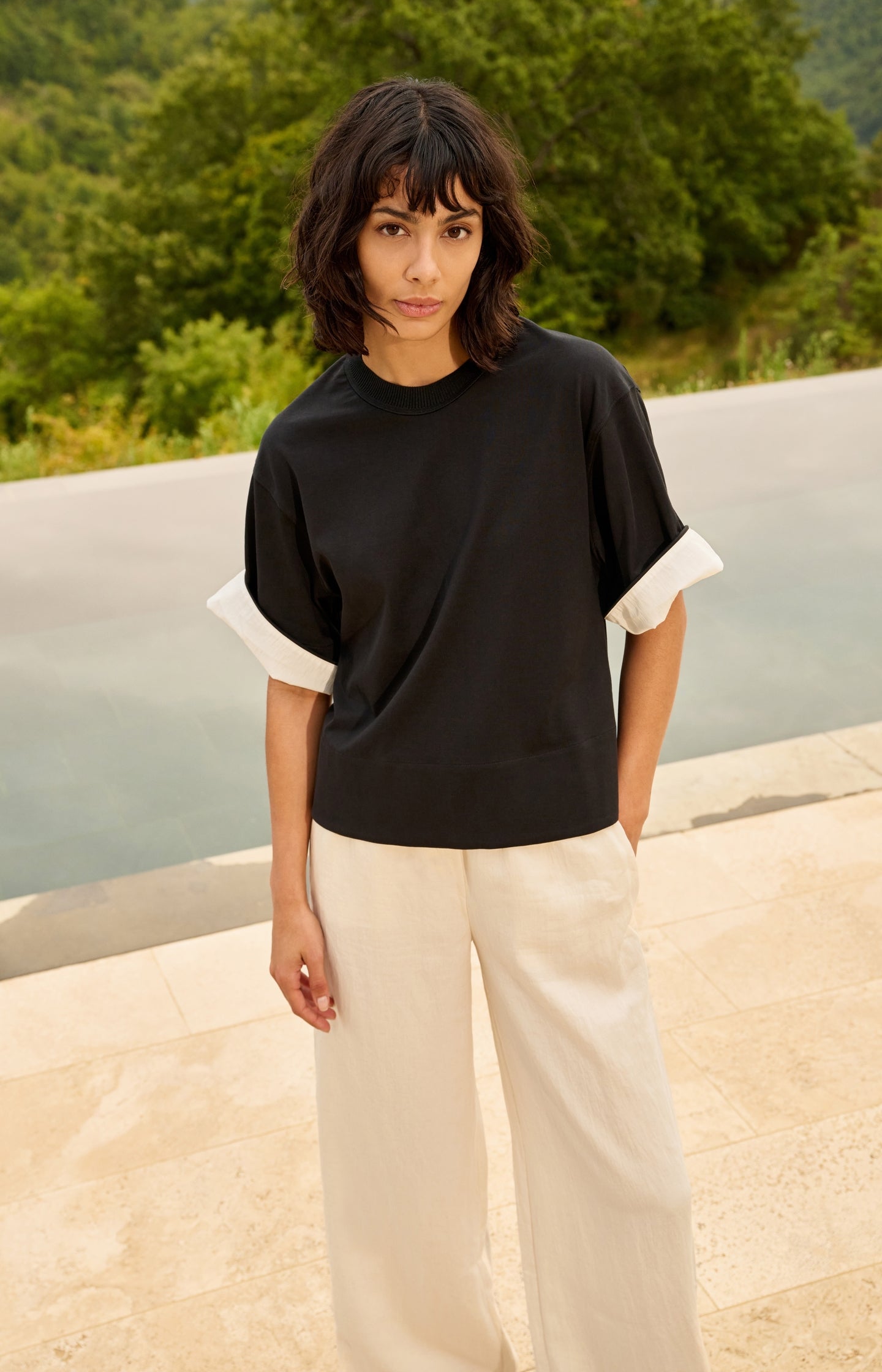 Jersey top with woven details and short sleeves