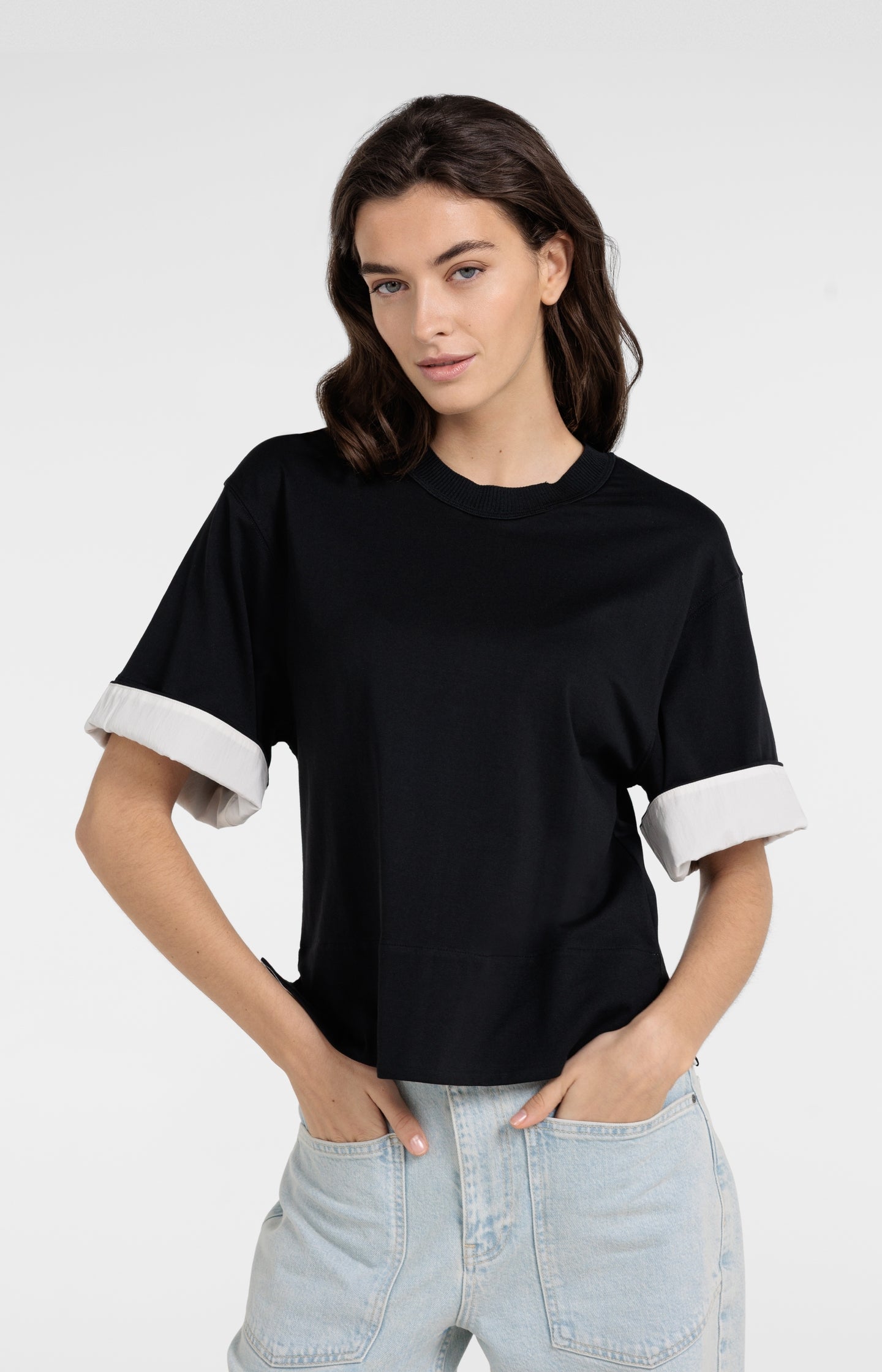 Jersey top with woven details and short sleeves