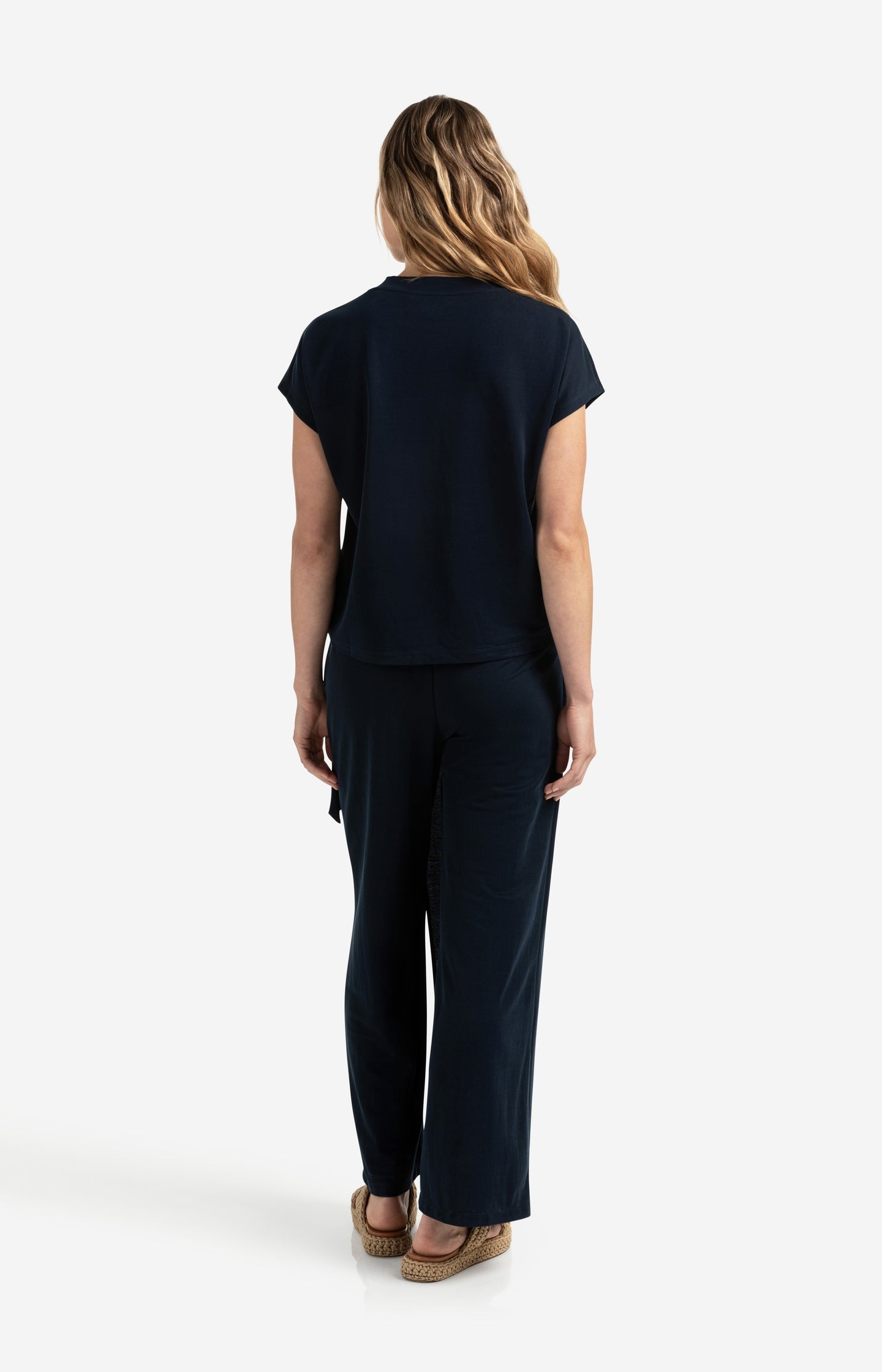 Jersey trousers with a wrap skirt effect and wide legs