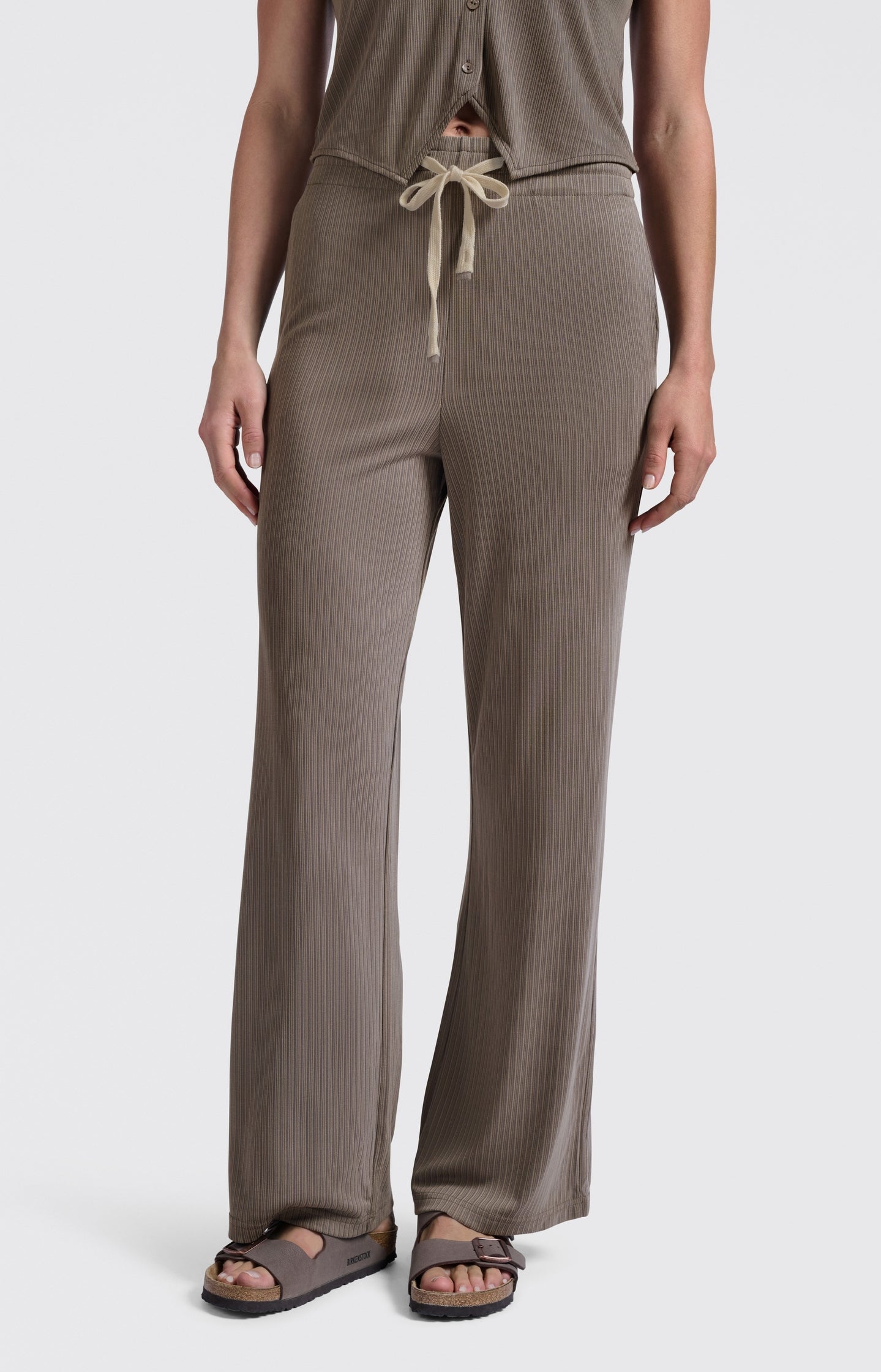 Jersey trousers with subtle ribbed texture and wide legs