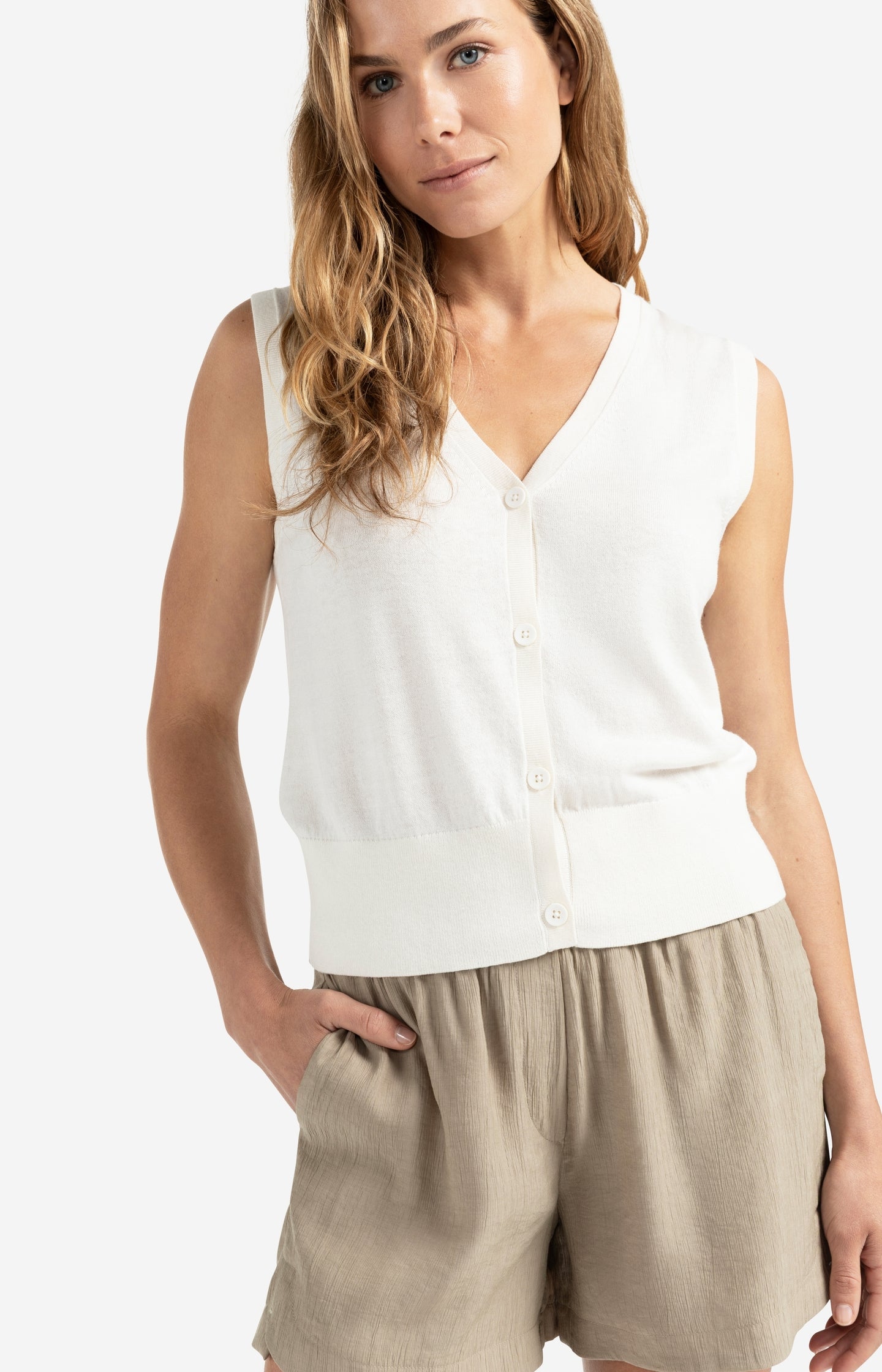 Knitted gilet with fine rib trims and button closure