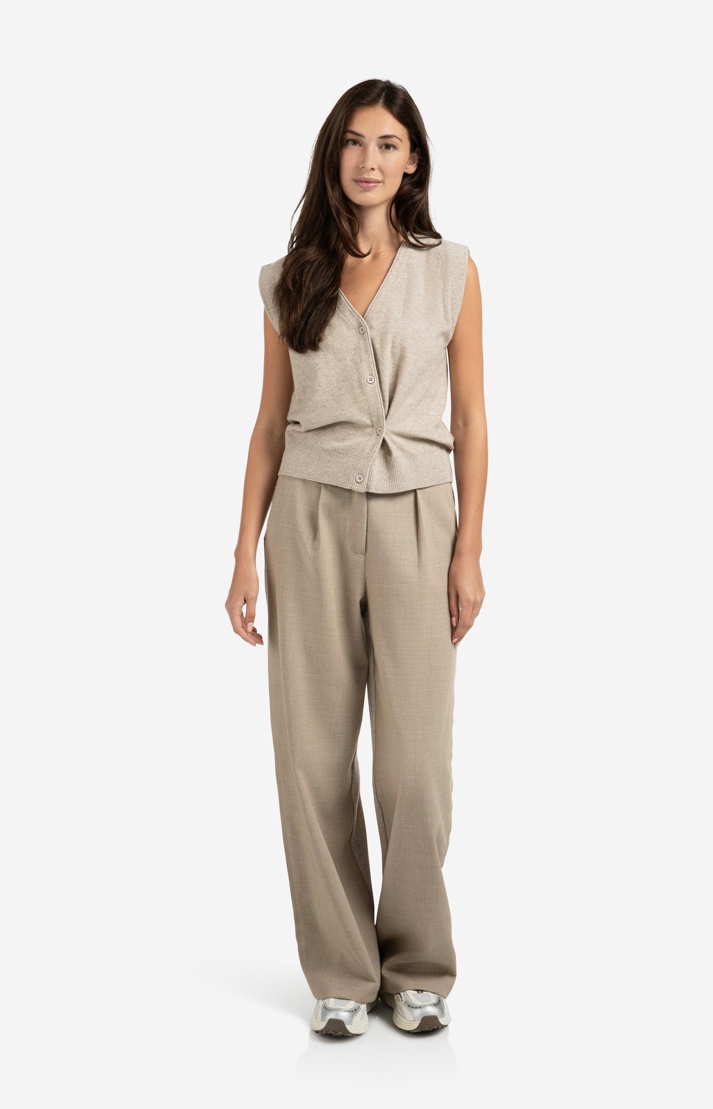 Knitted gilet with V-neck and asymmetric buttoning