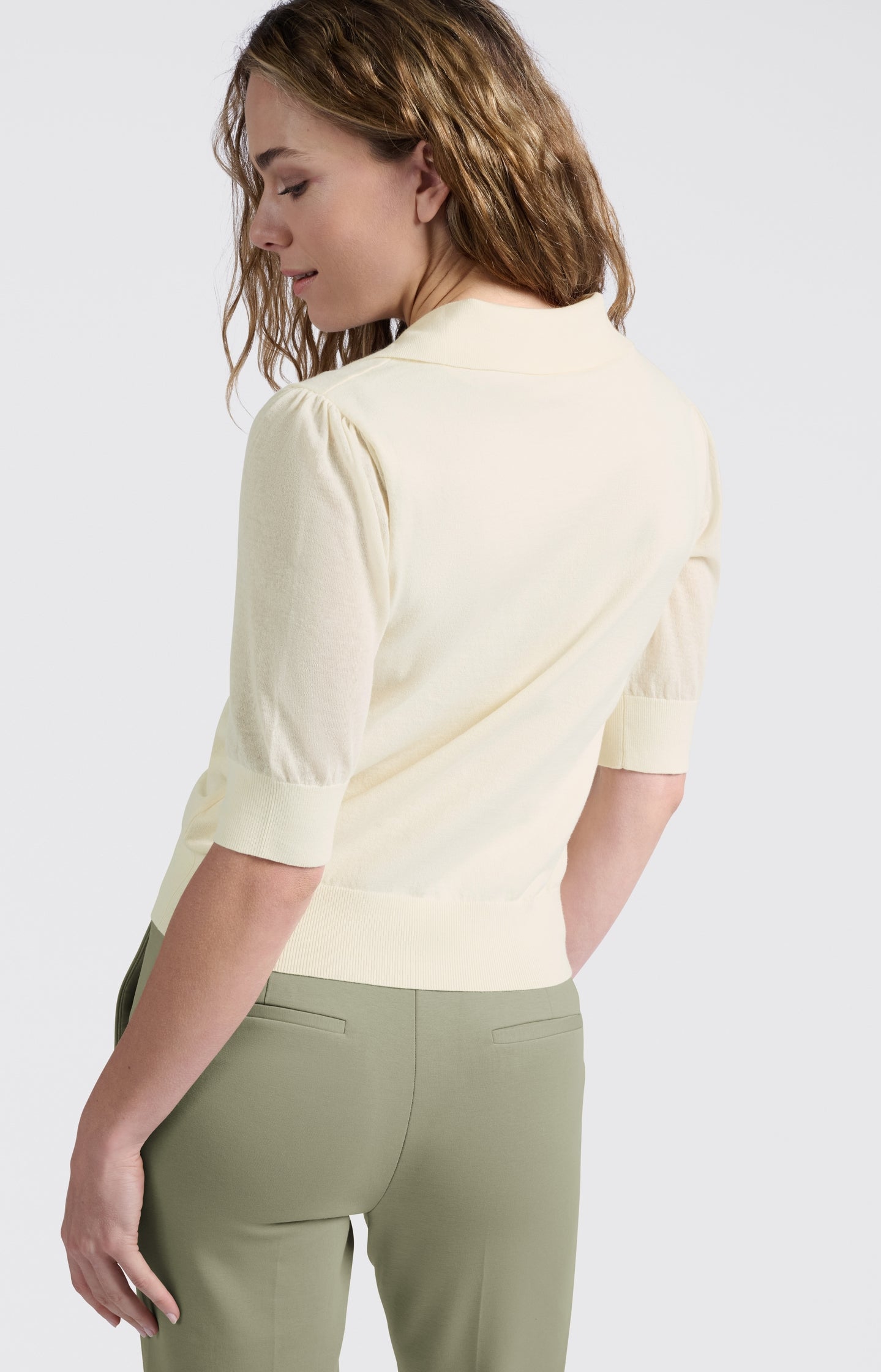 Knitted polo with half sleeves