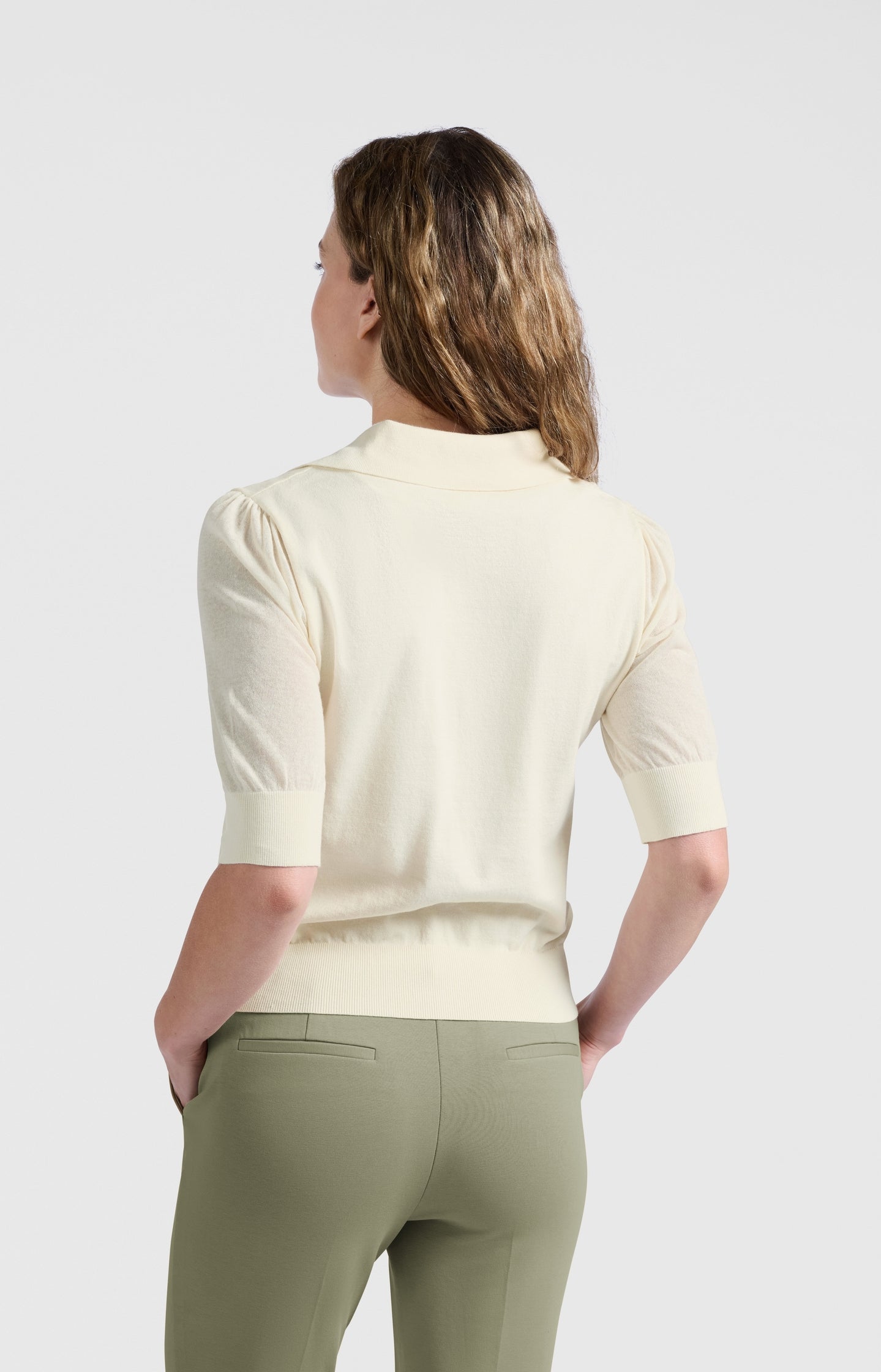 Knitted polo with half sleeves