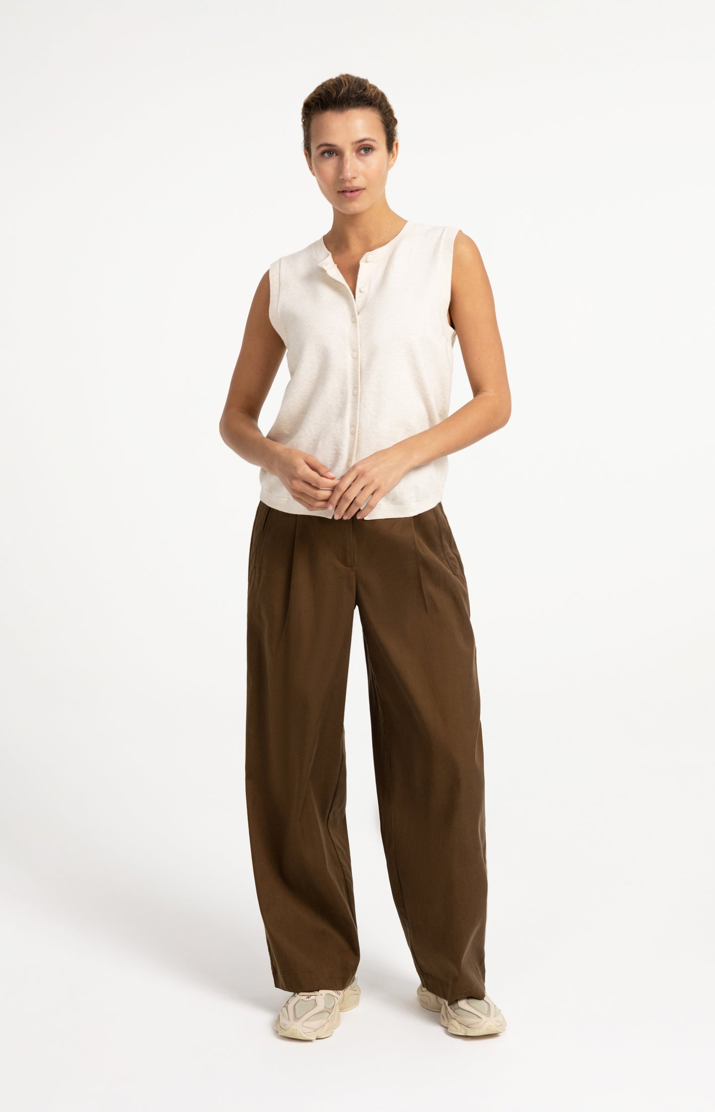 Knitted spencer with button closure