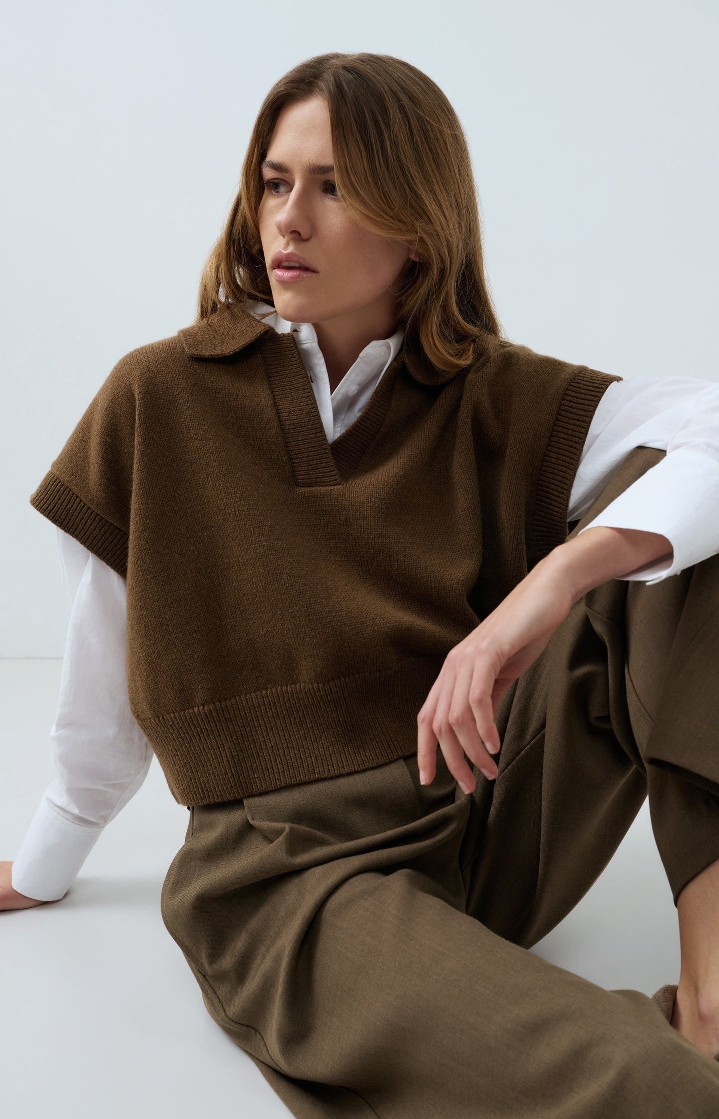 Knitted spencer with collar and short sleeves