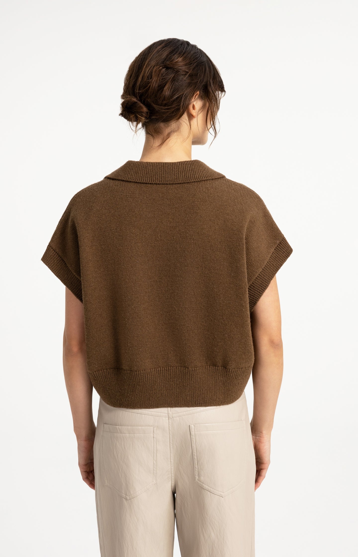 Knitted spencer with collar and short sleeves