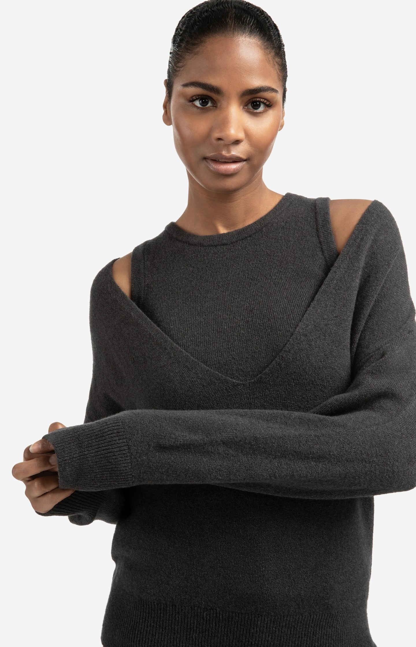 Knitted sweater with deep V-neck and layered top