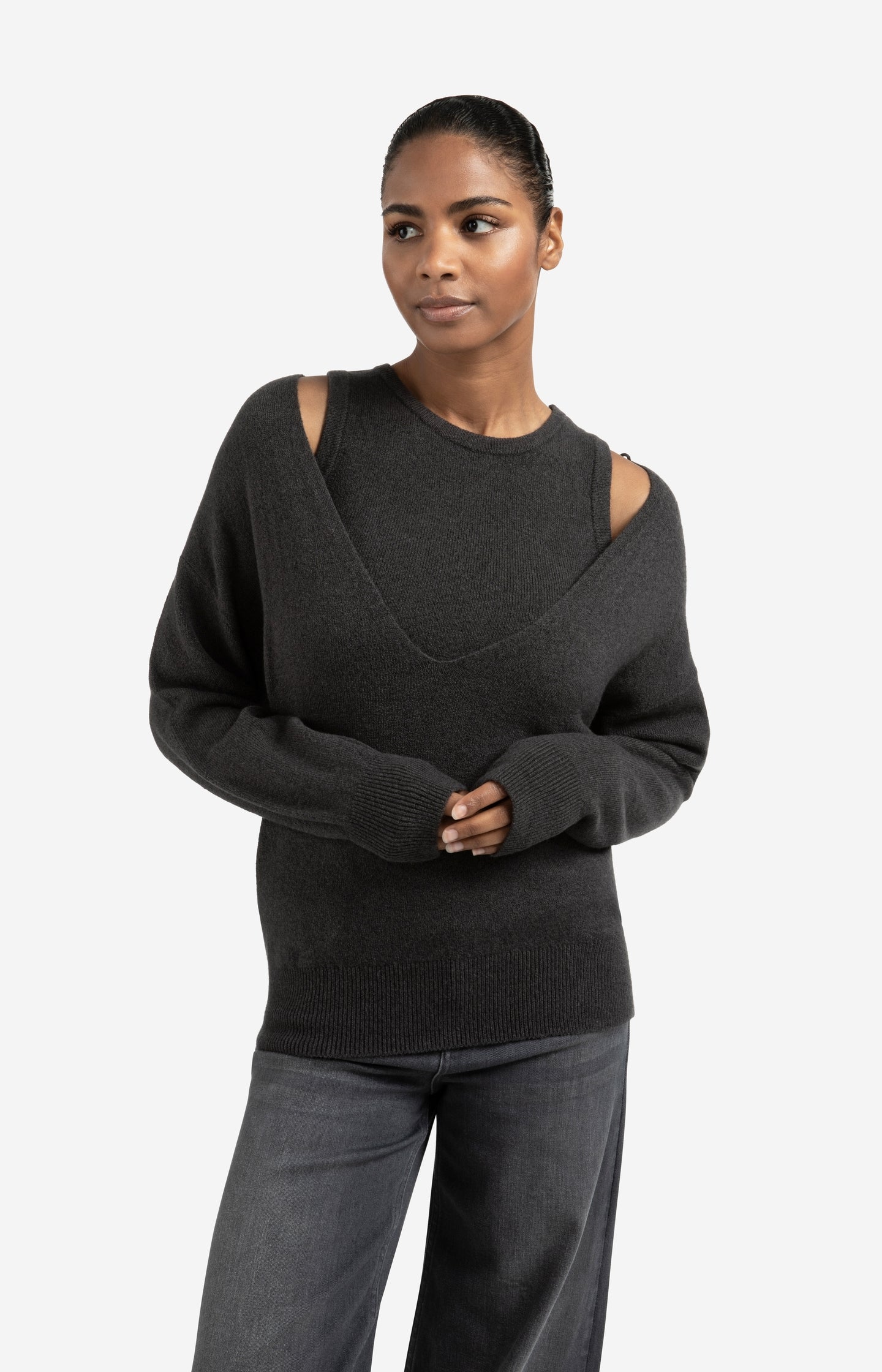 Knitted sweater with deep V-neck and layered top