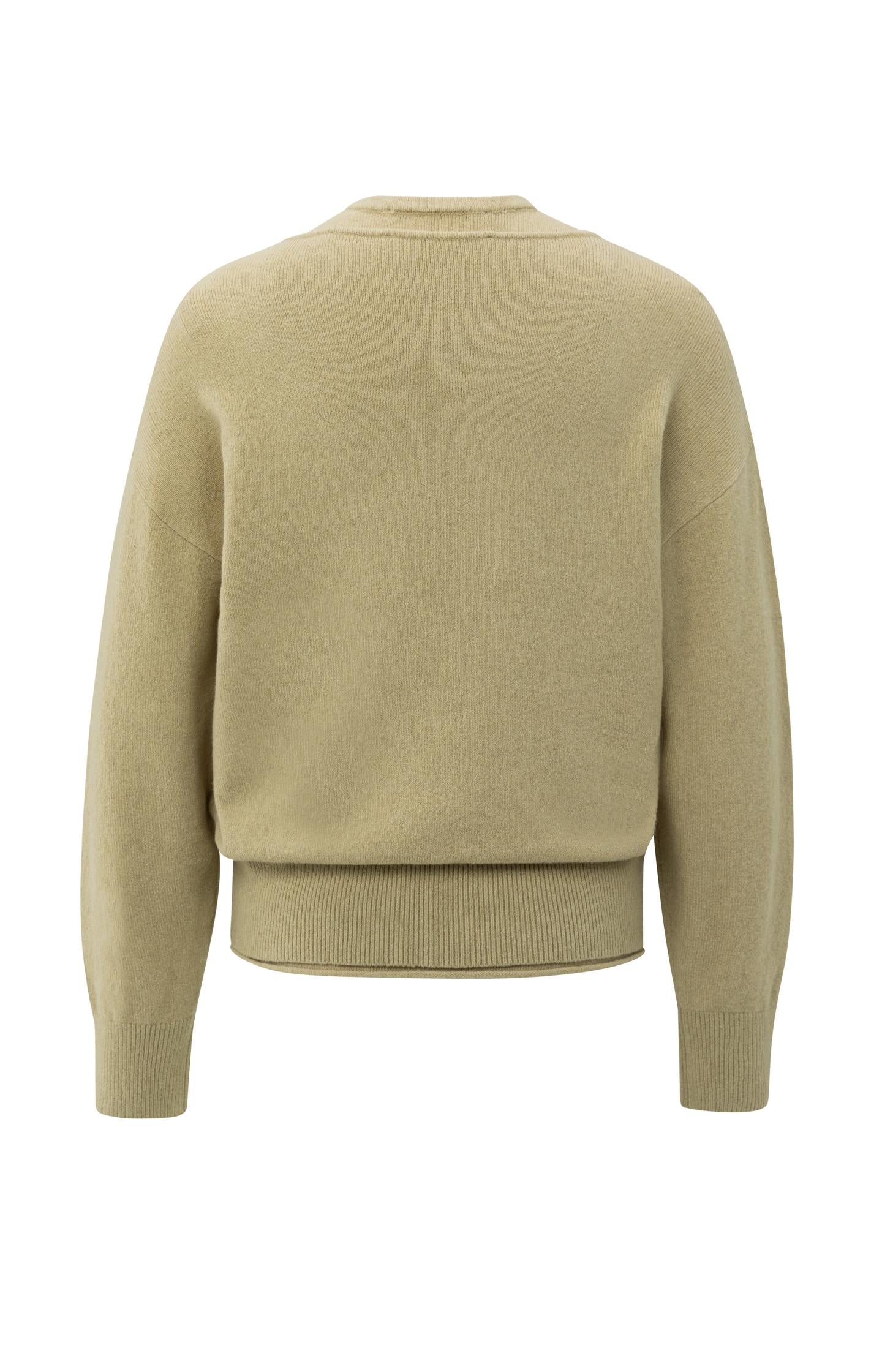 Knitted sweater with deep V-neck and layered top