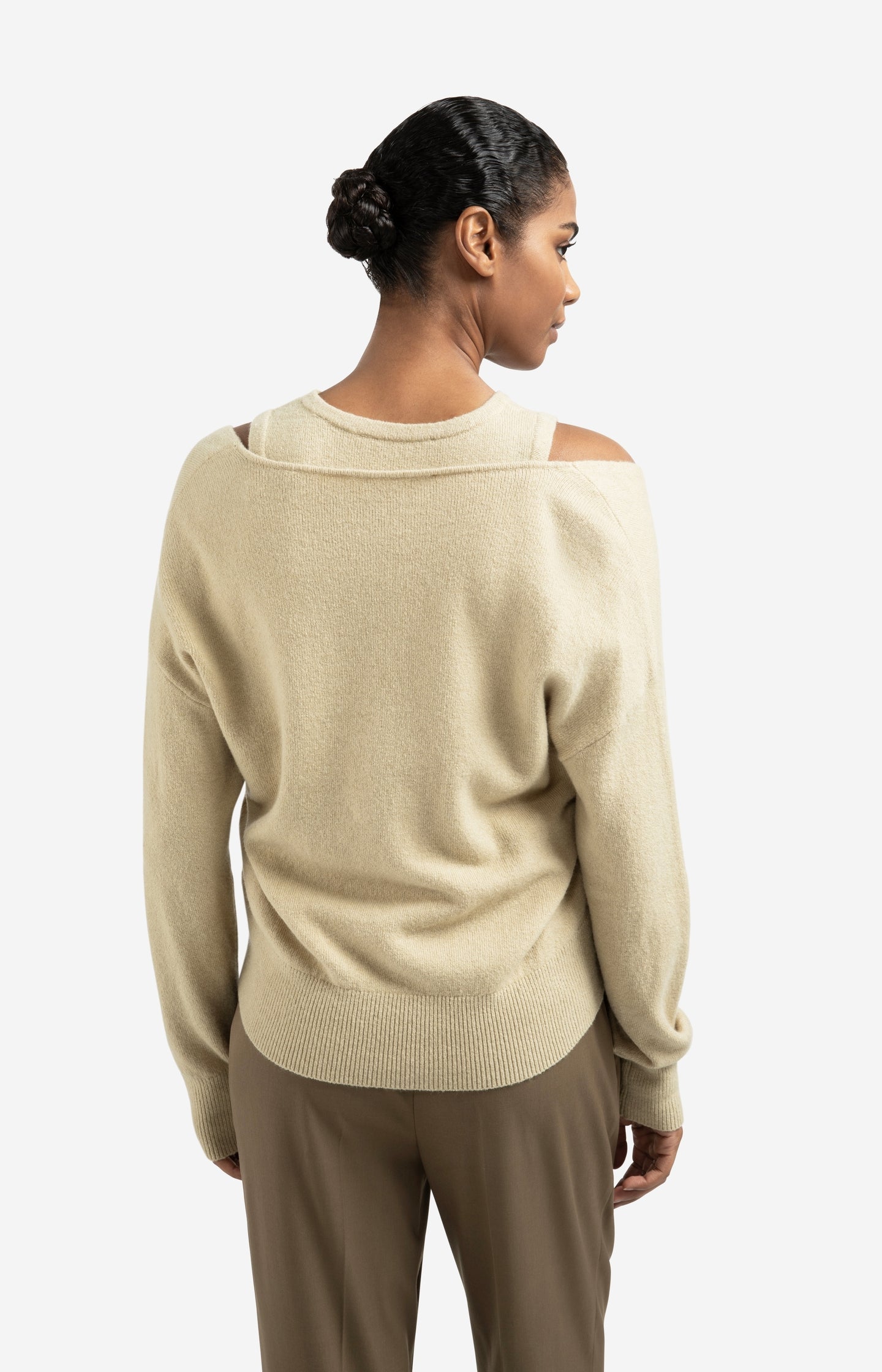 Knitted sweater with deep V-neck and layered top