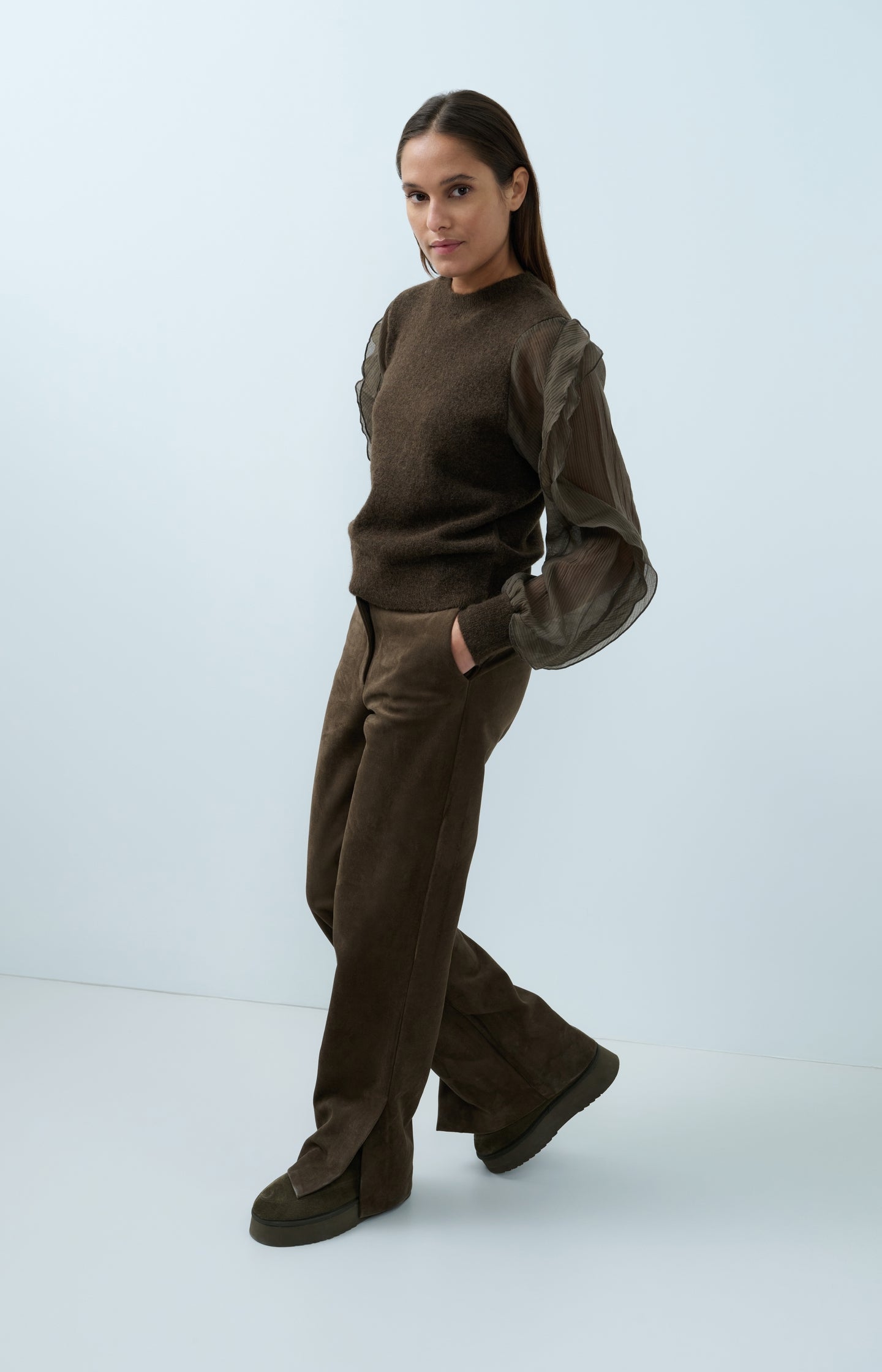 Knitted sweater with ruffle sleeves