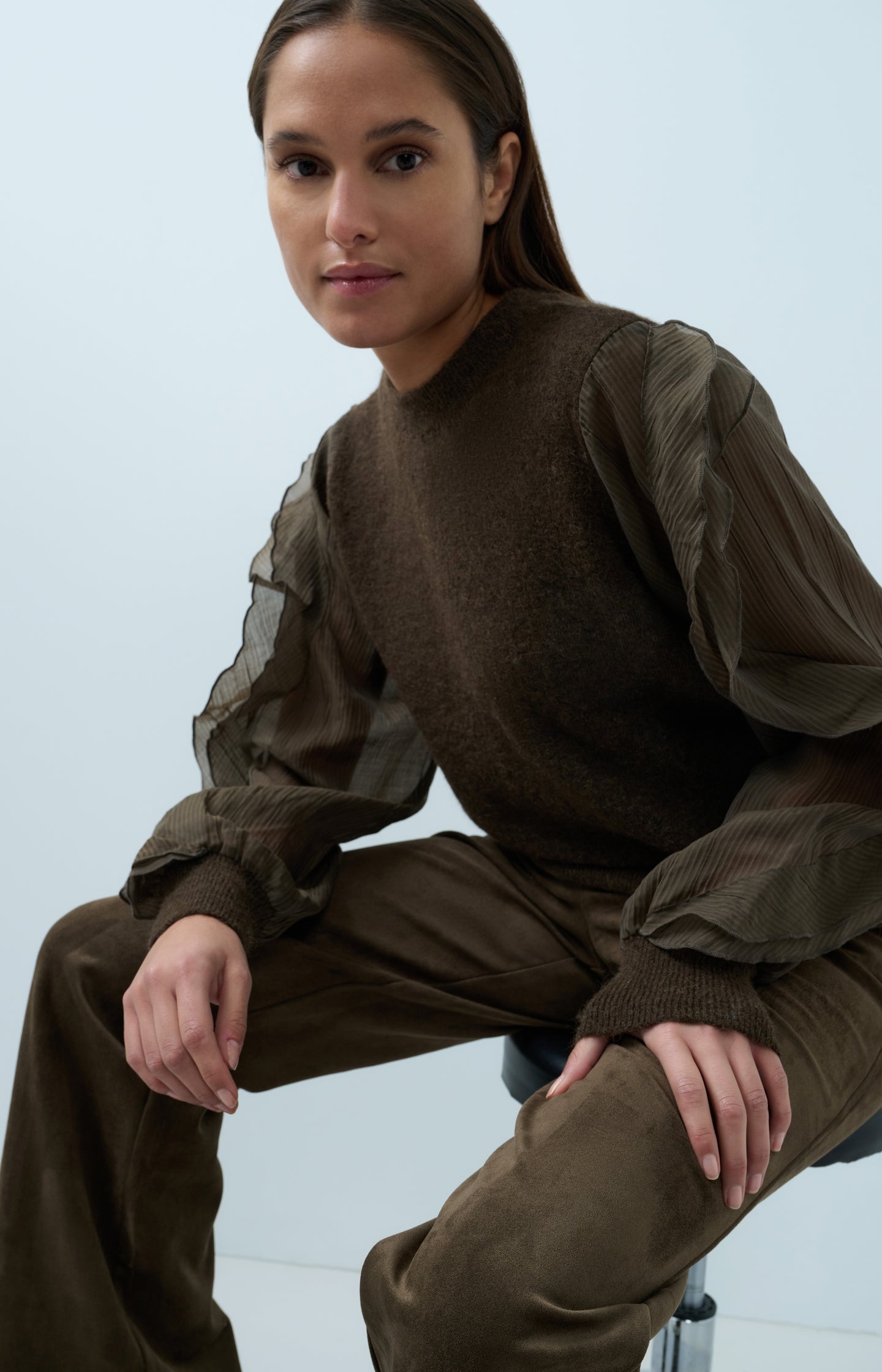 Knitted sweater with ruffle sleeves