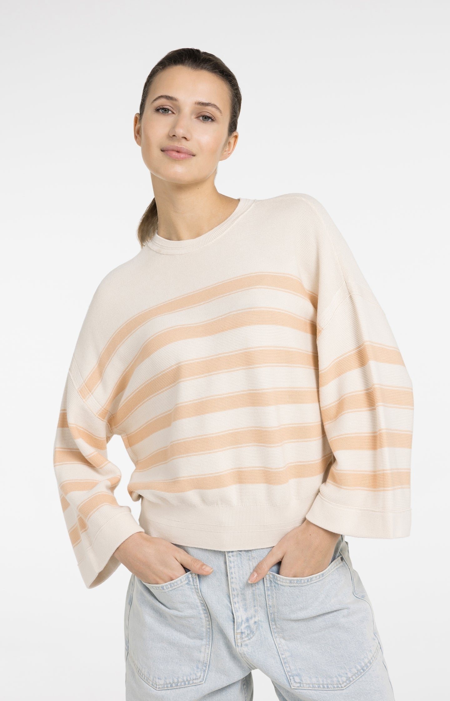 Knitted sweater with stripes and wide sleeves