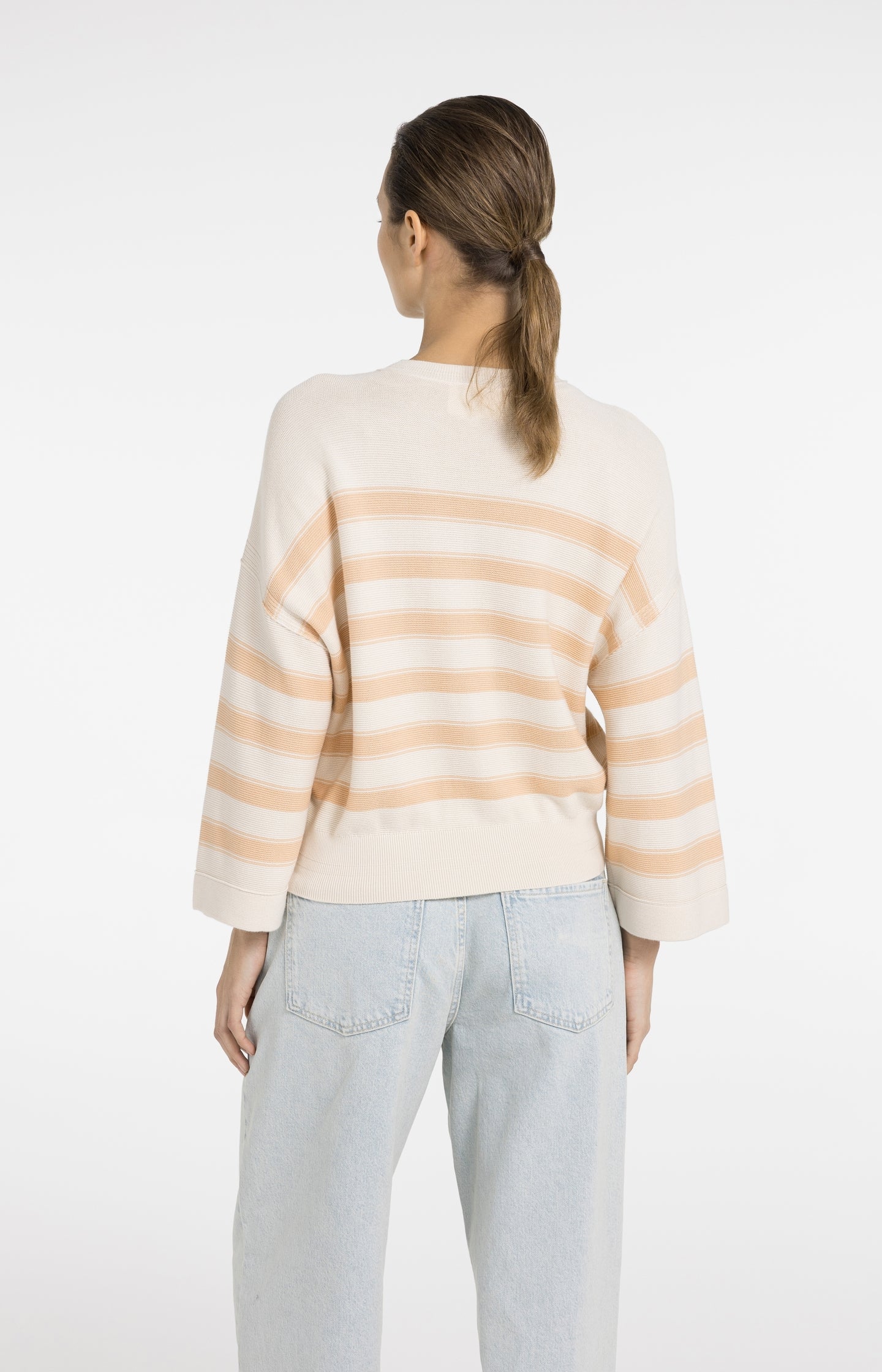 Knitted sweater with stripes and wide sleeves
