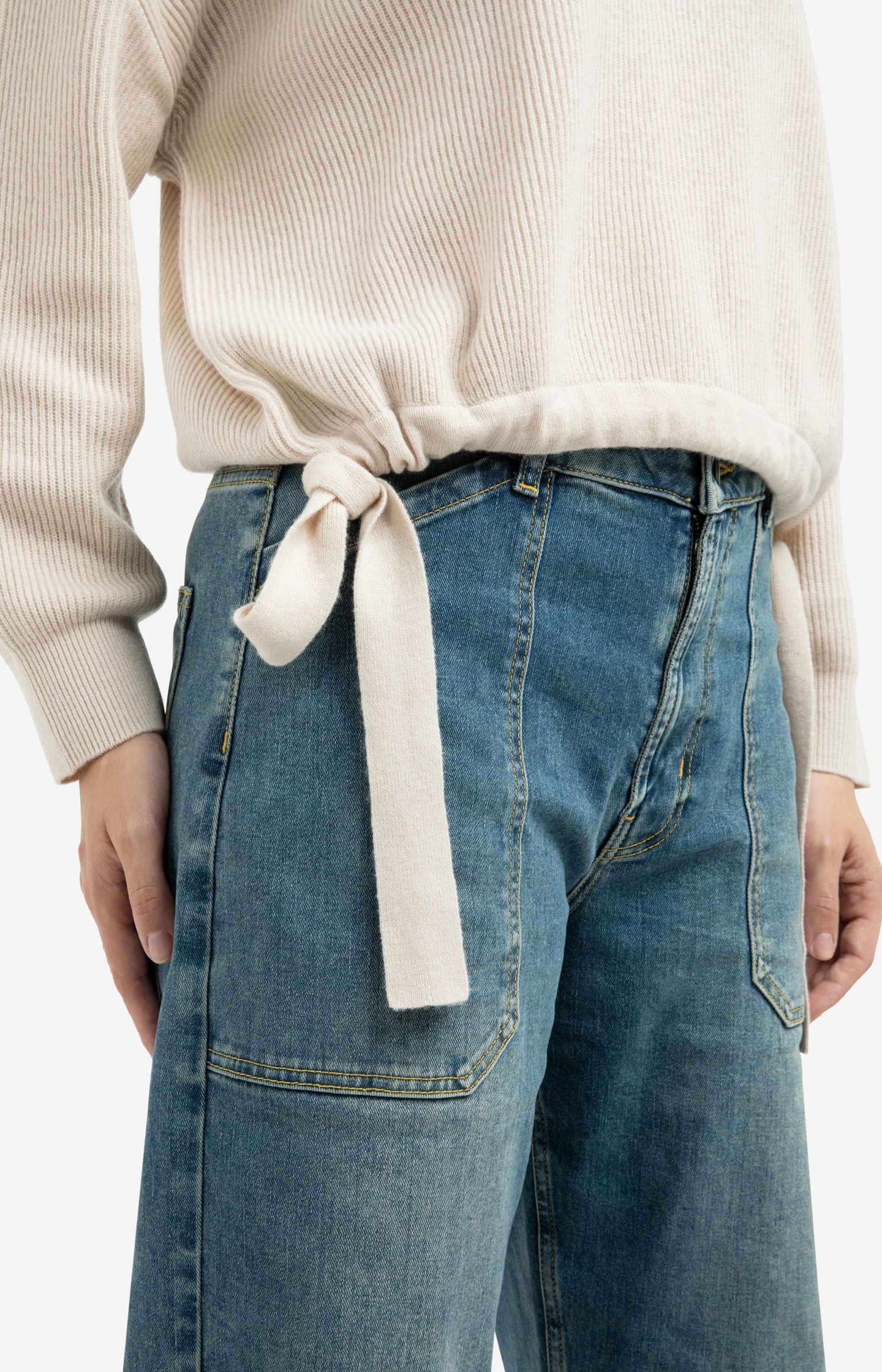 Knitted sweater with tie details at the hem - Type: lookbook