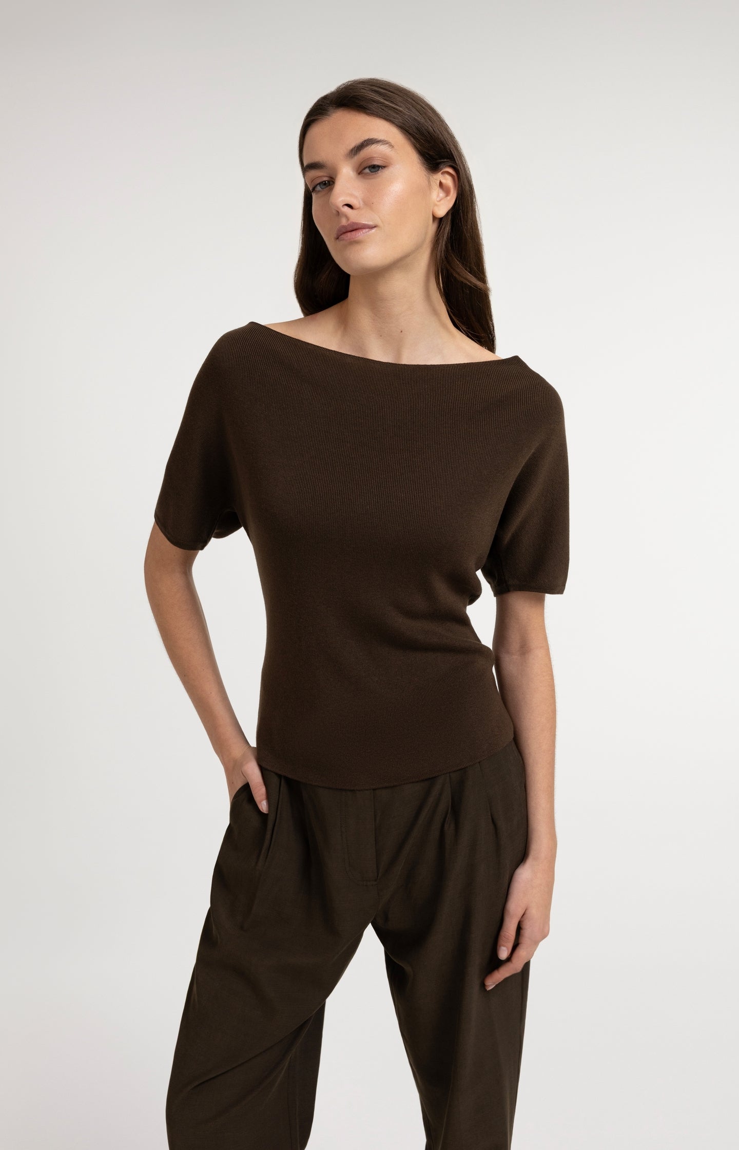 Knitted top with short sleeves and draped neckline