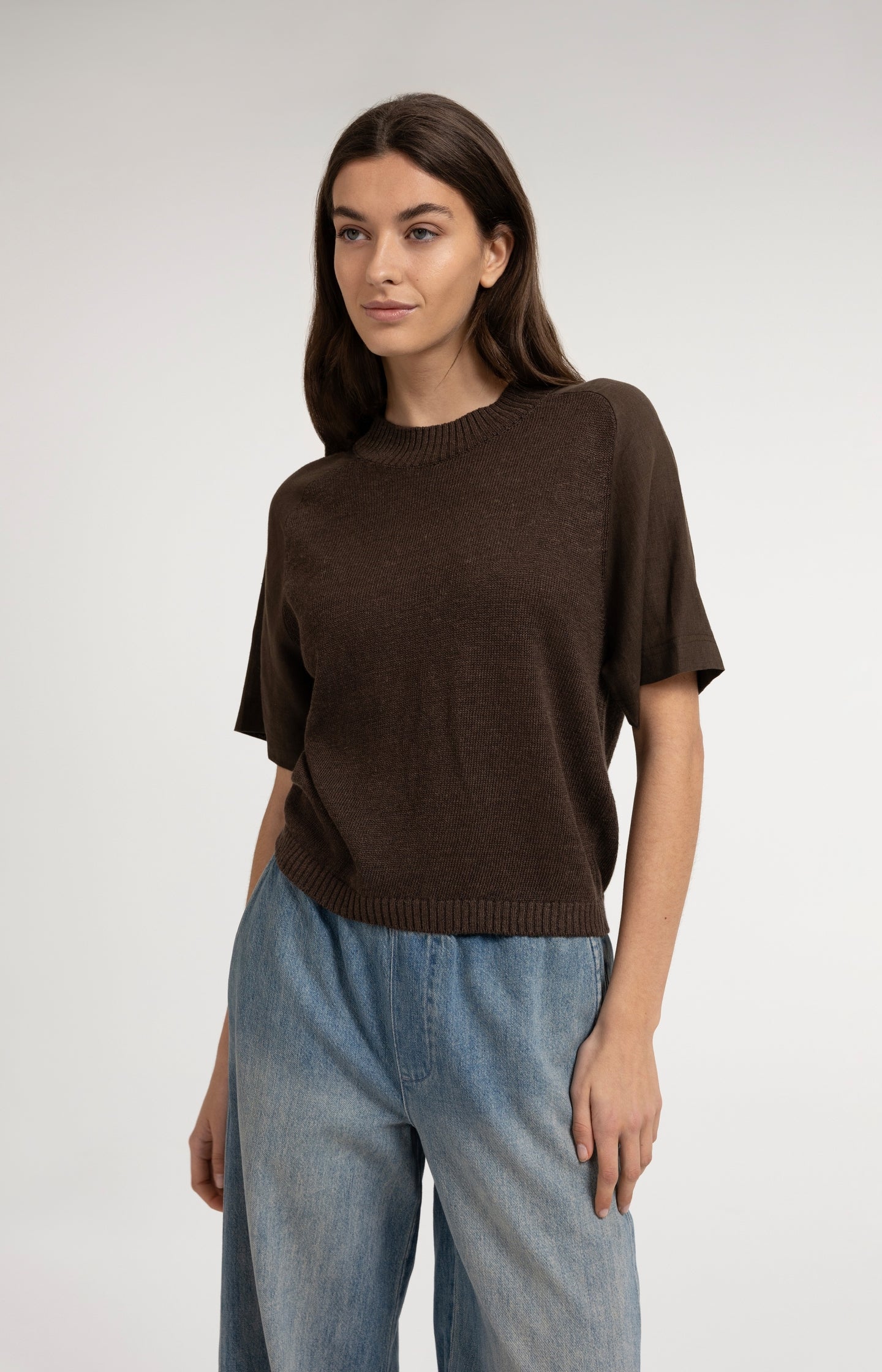 Knitted top with short sleeves and ribbed neckline
