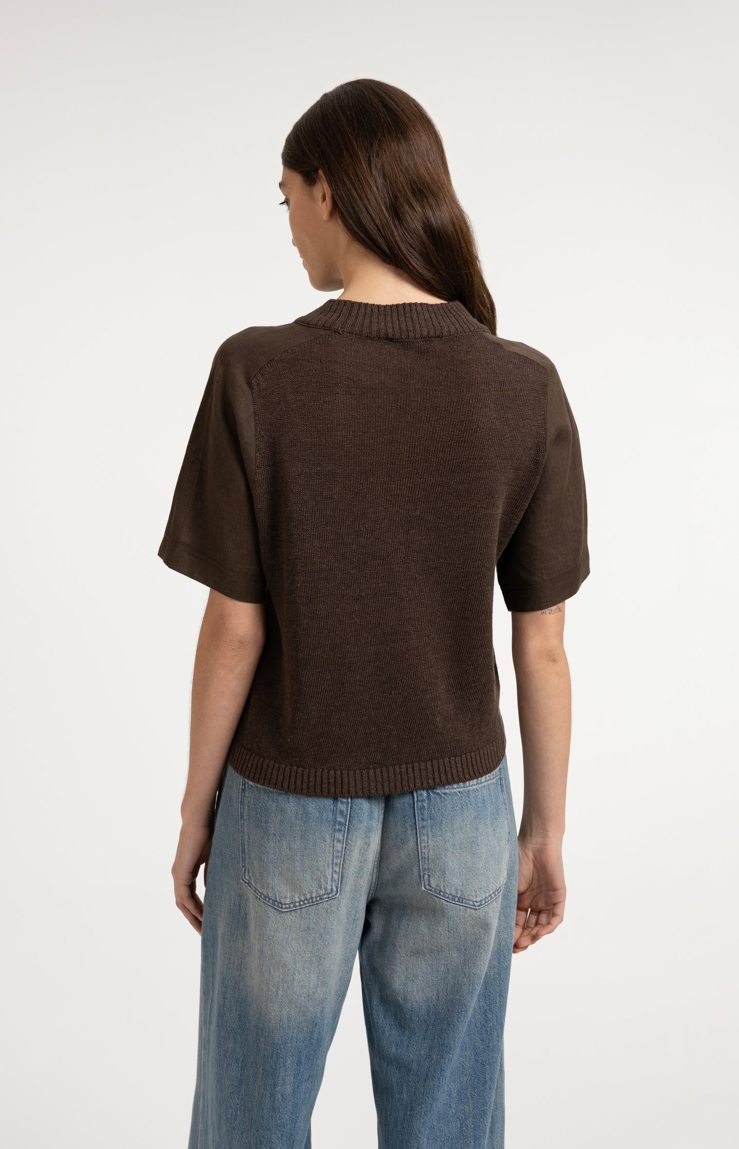 Knitted top with short sleeves and ribbed neckline