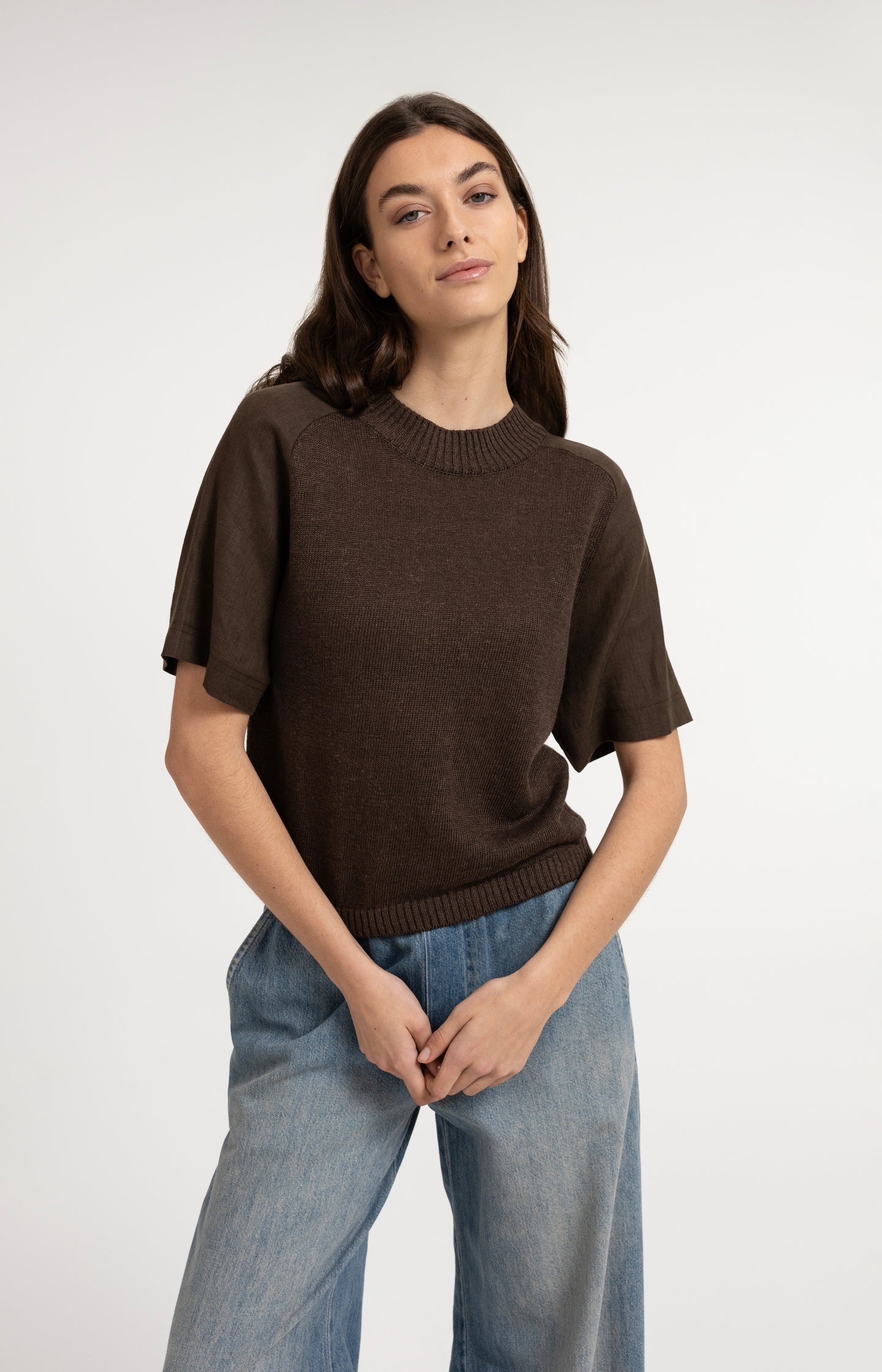 Knitted top with short sleeves and ribbed neckline