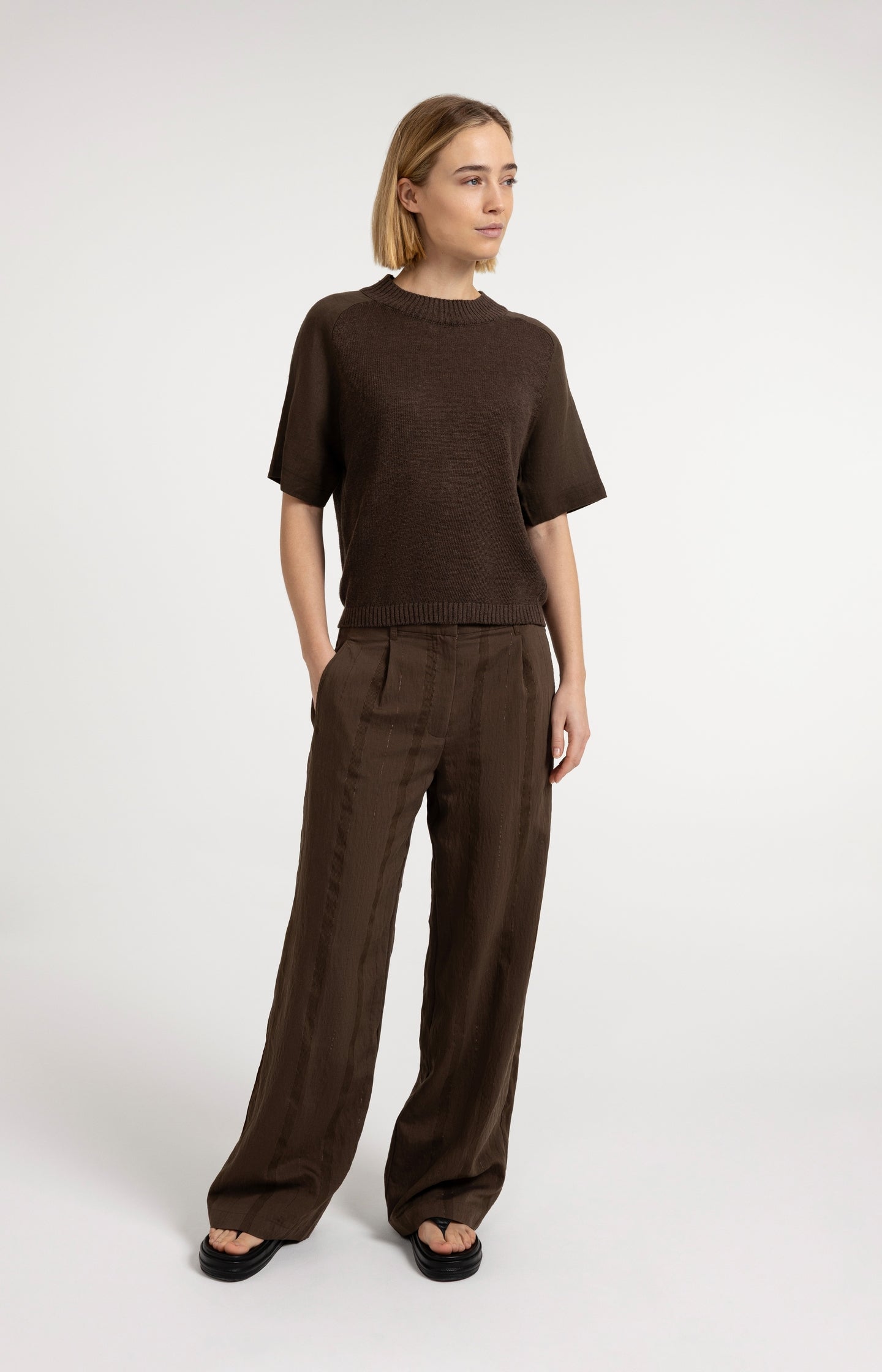 Knitted top with short sleeves and ribbed neckline