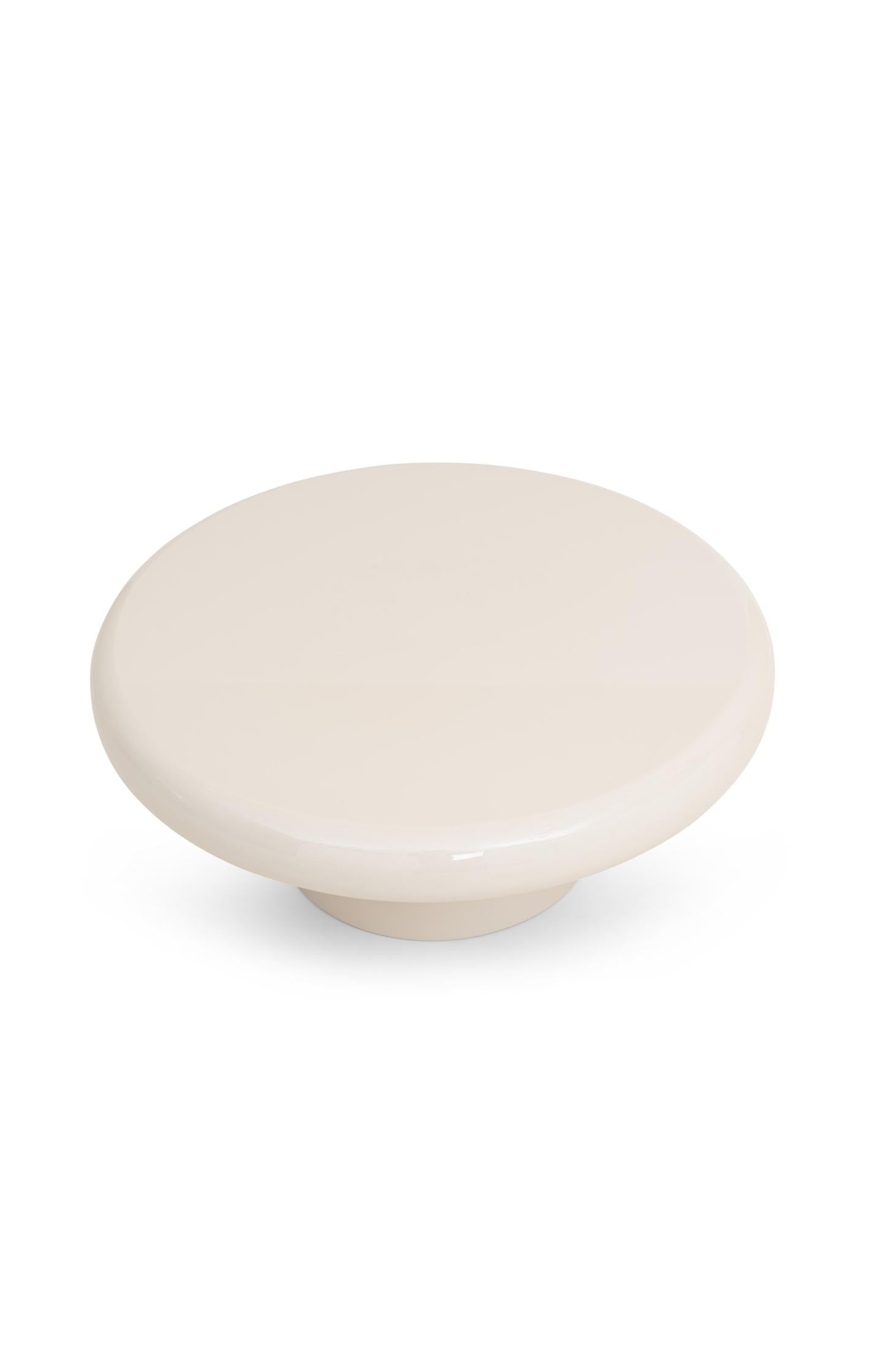 Large round coffee table with glossy finish