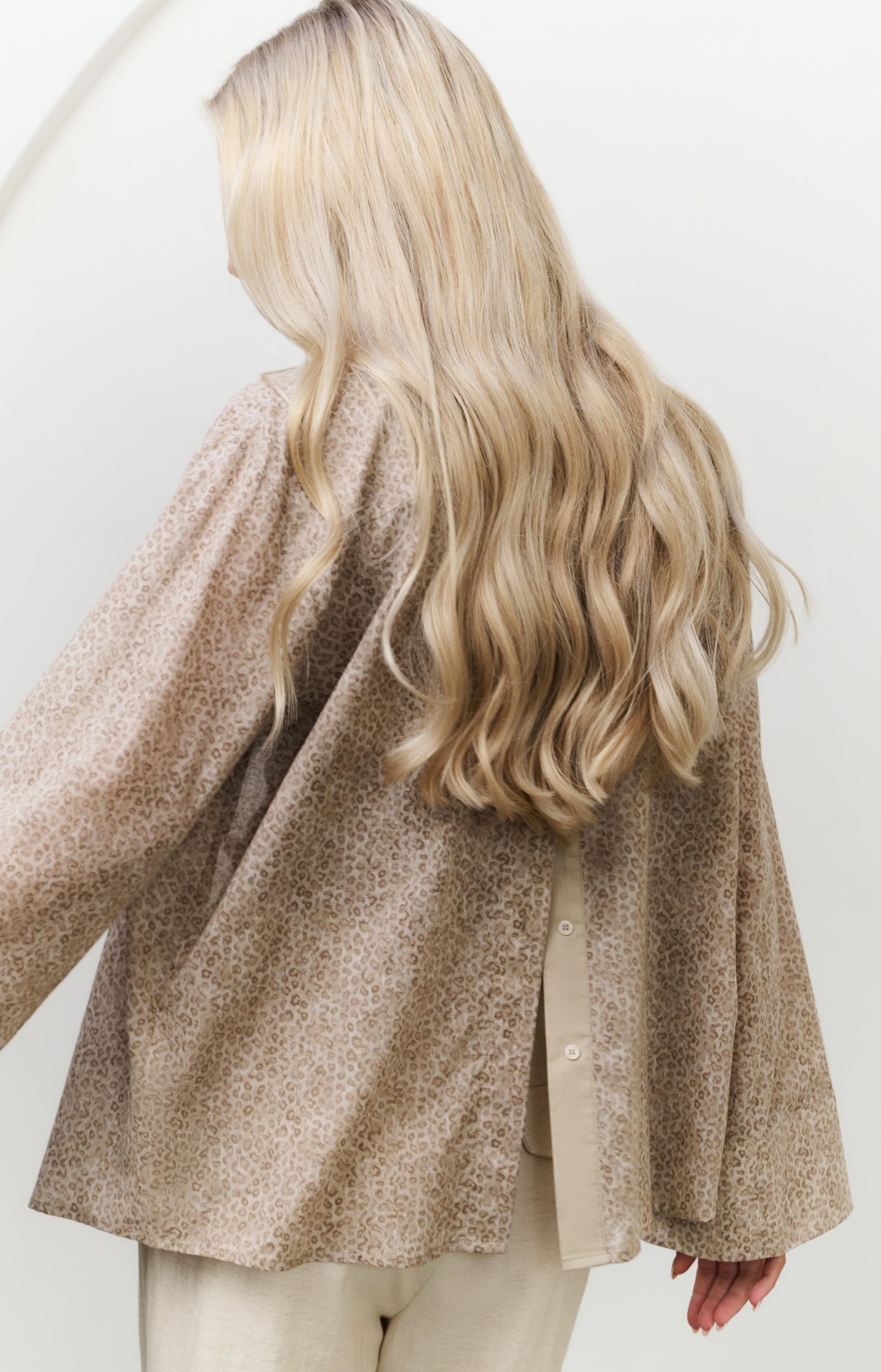 Leopard print blouse with back button detail