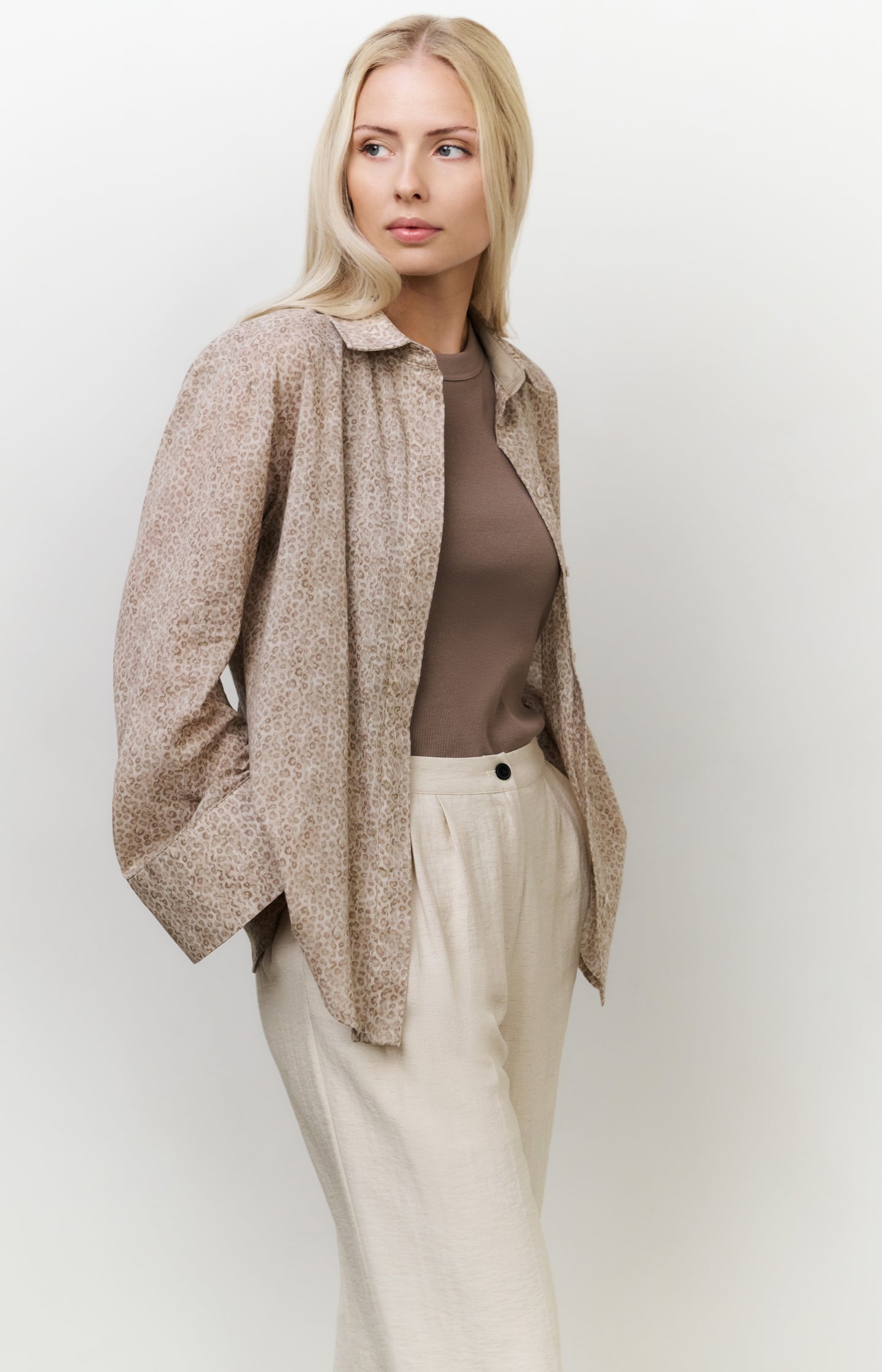 Leopard print blouse with back button detail