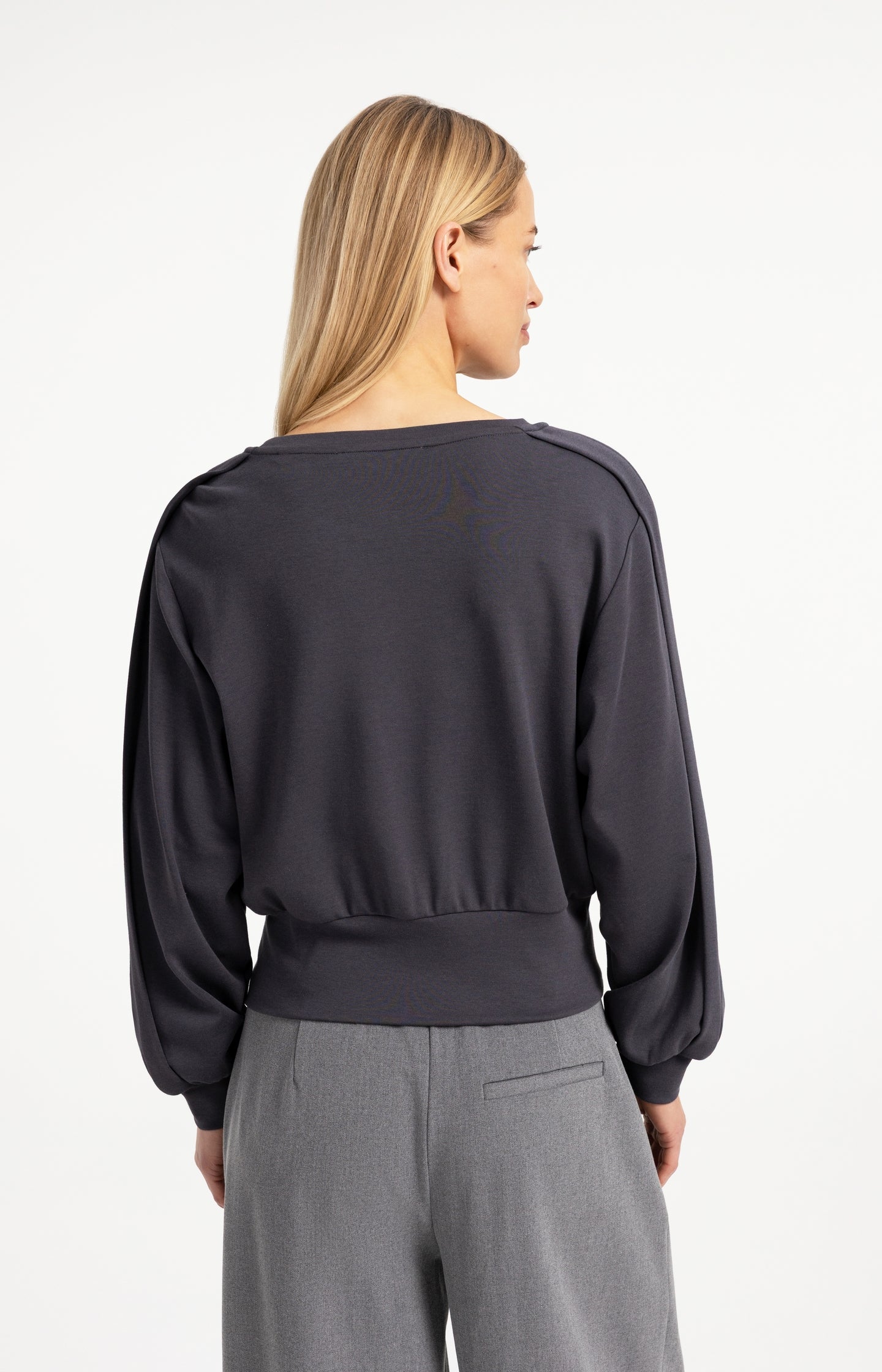 Lightweight sweater with waistband and folded detail