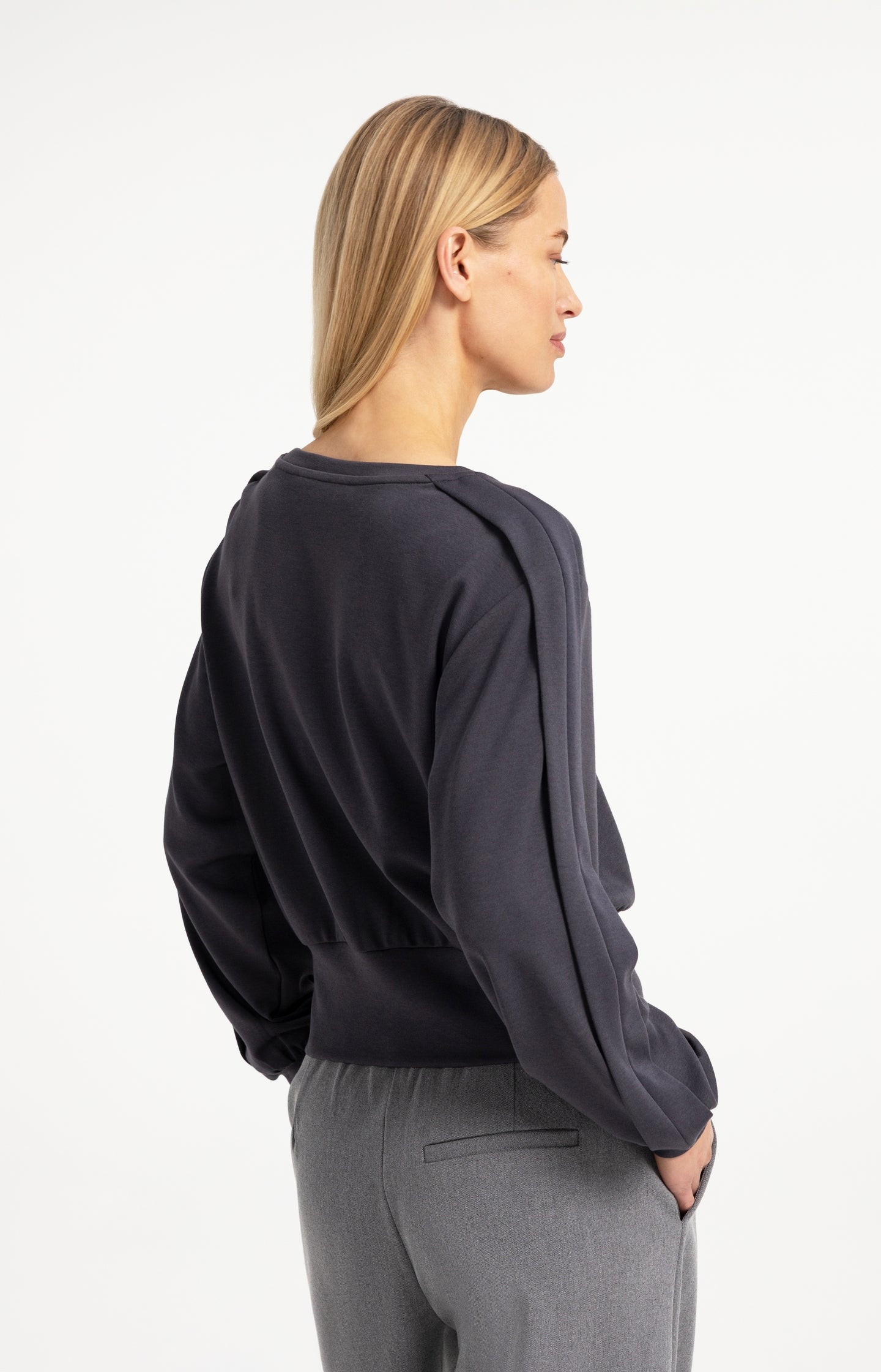 Lightweight sweater with waistband and folded detail