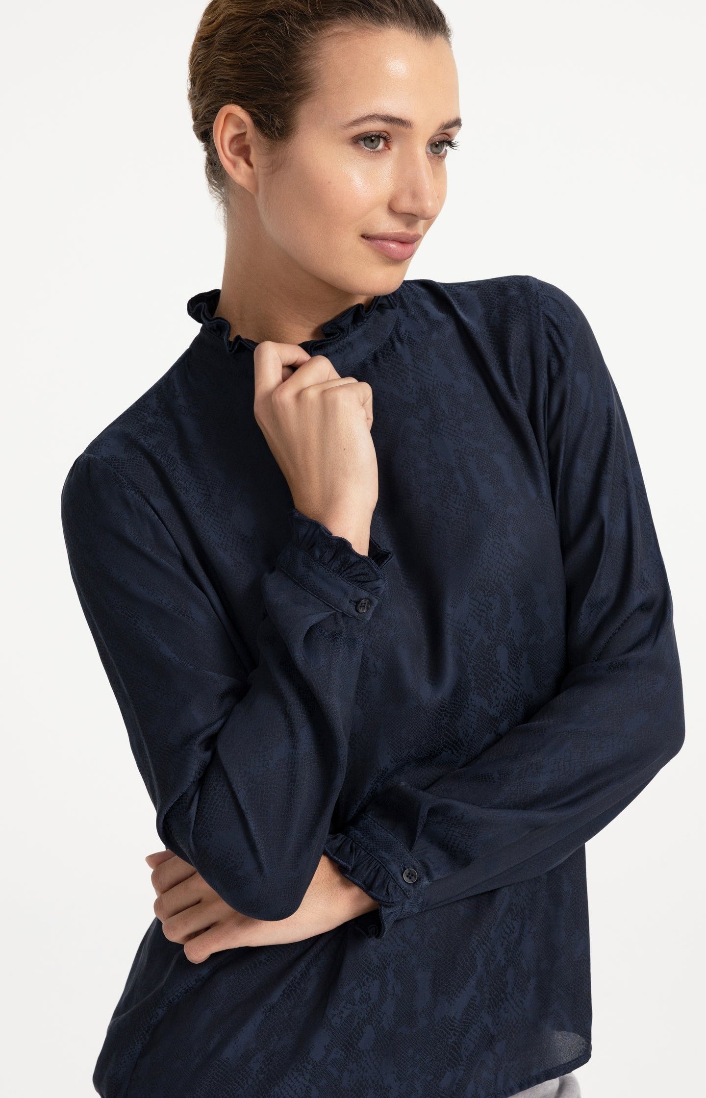 Long sleeve top with ruffle details