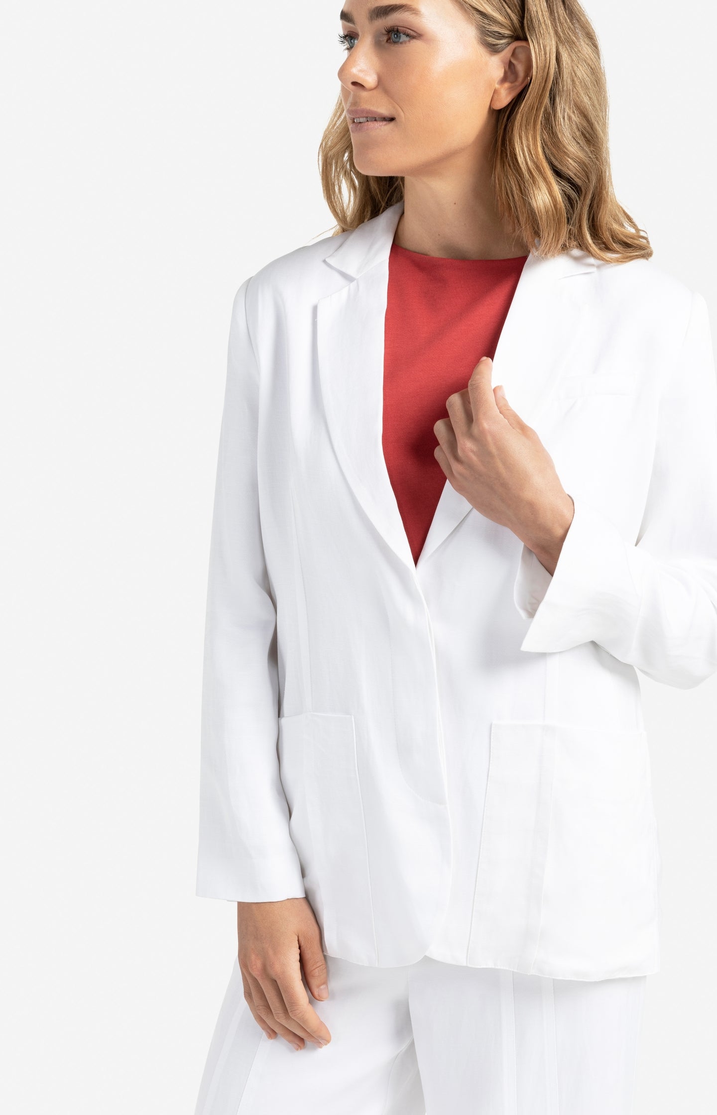Loose fit blazer with patch pockets and slit details