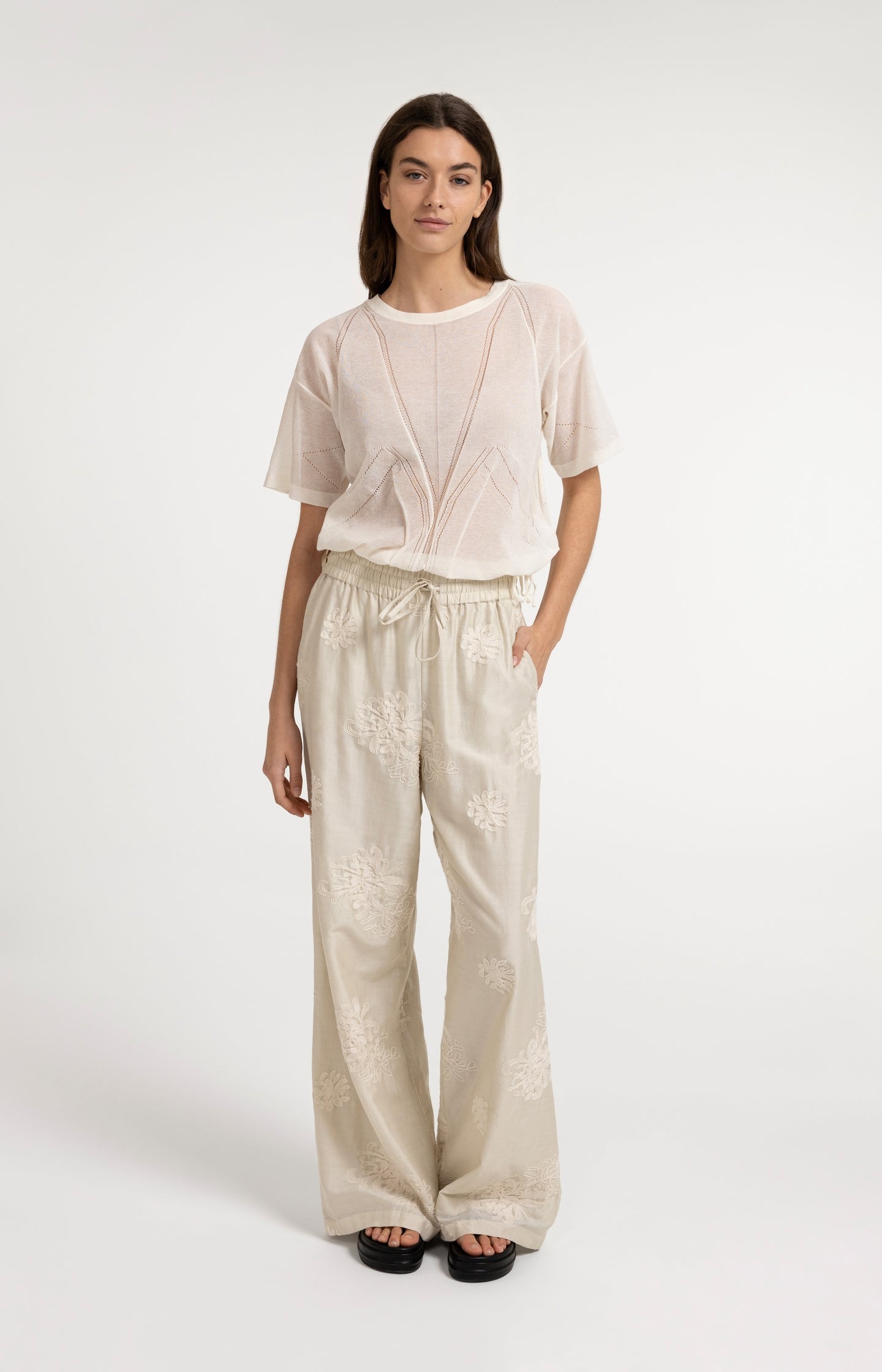 Open-knit top with ajour pattern and tie details