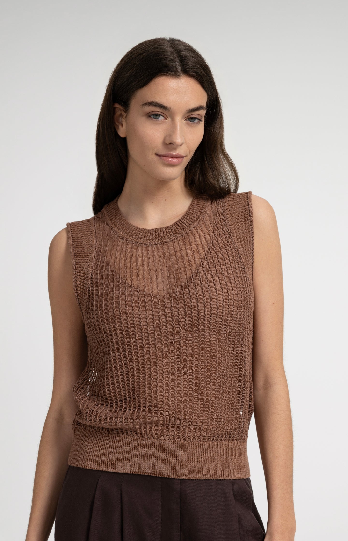 Open-knit top with matching underlayer