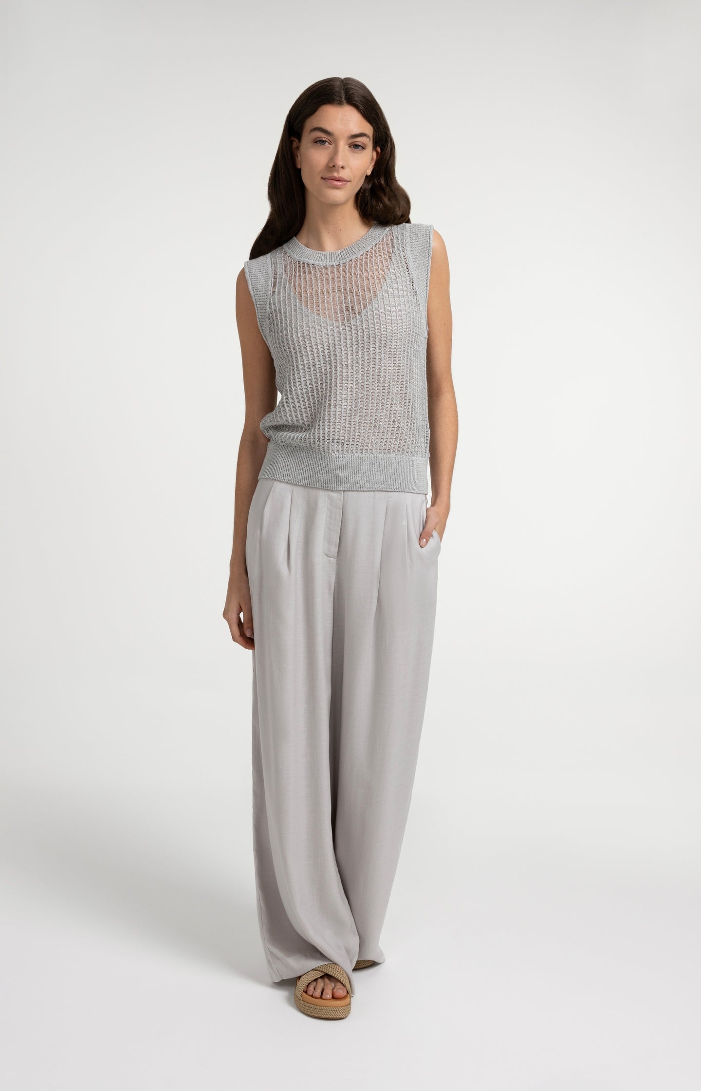 Open-knit top with matching underlayer