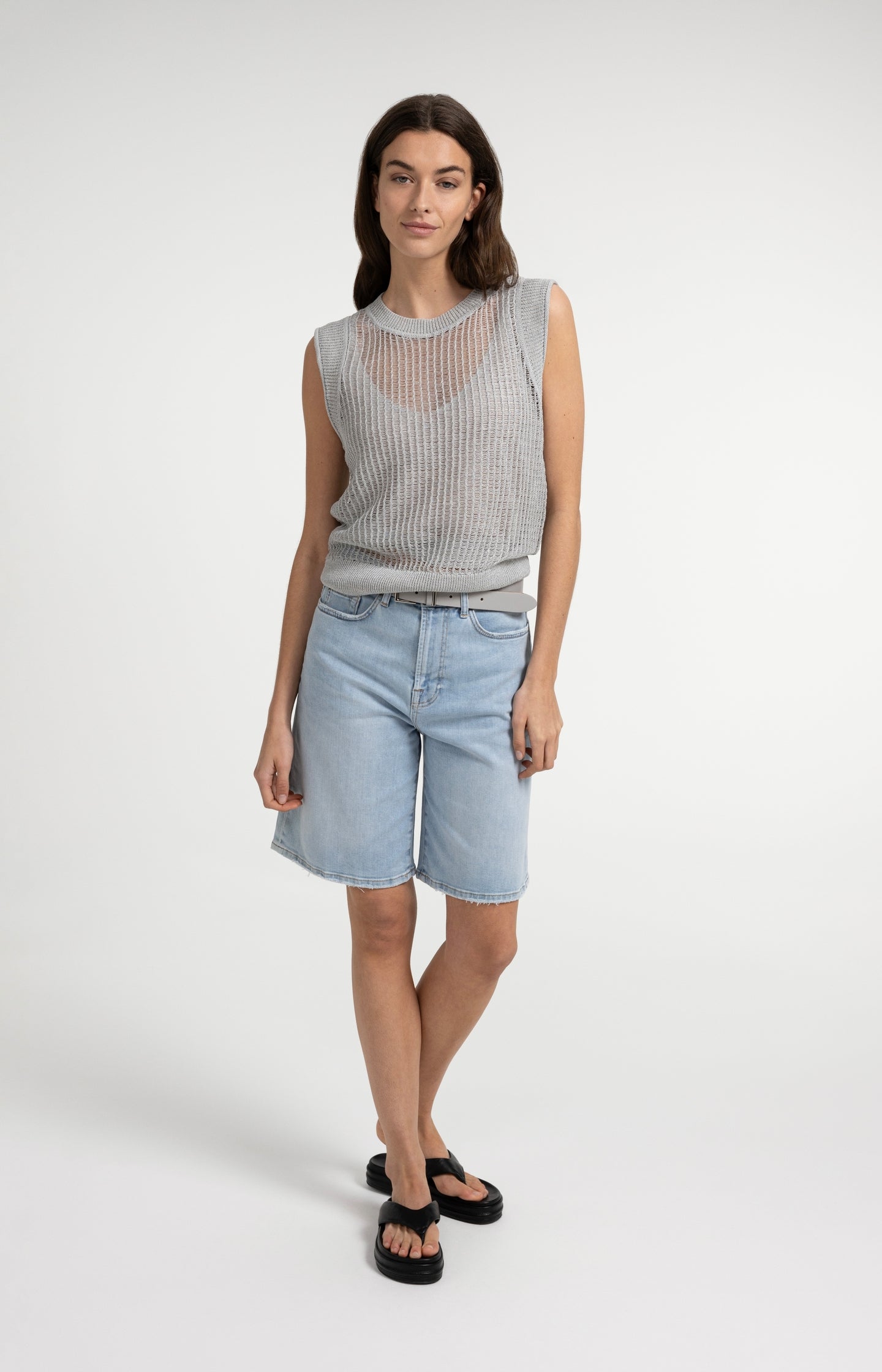 Open-knit top with matching underlayer