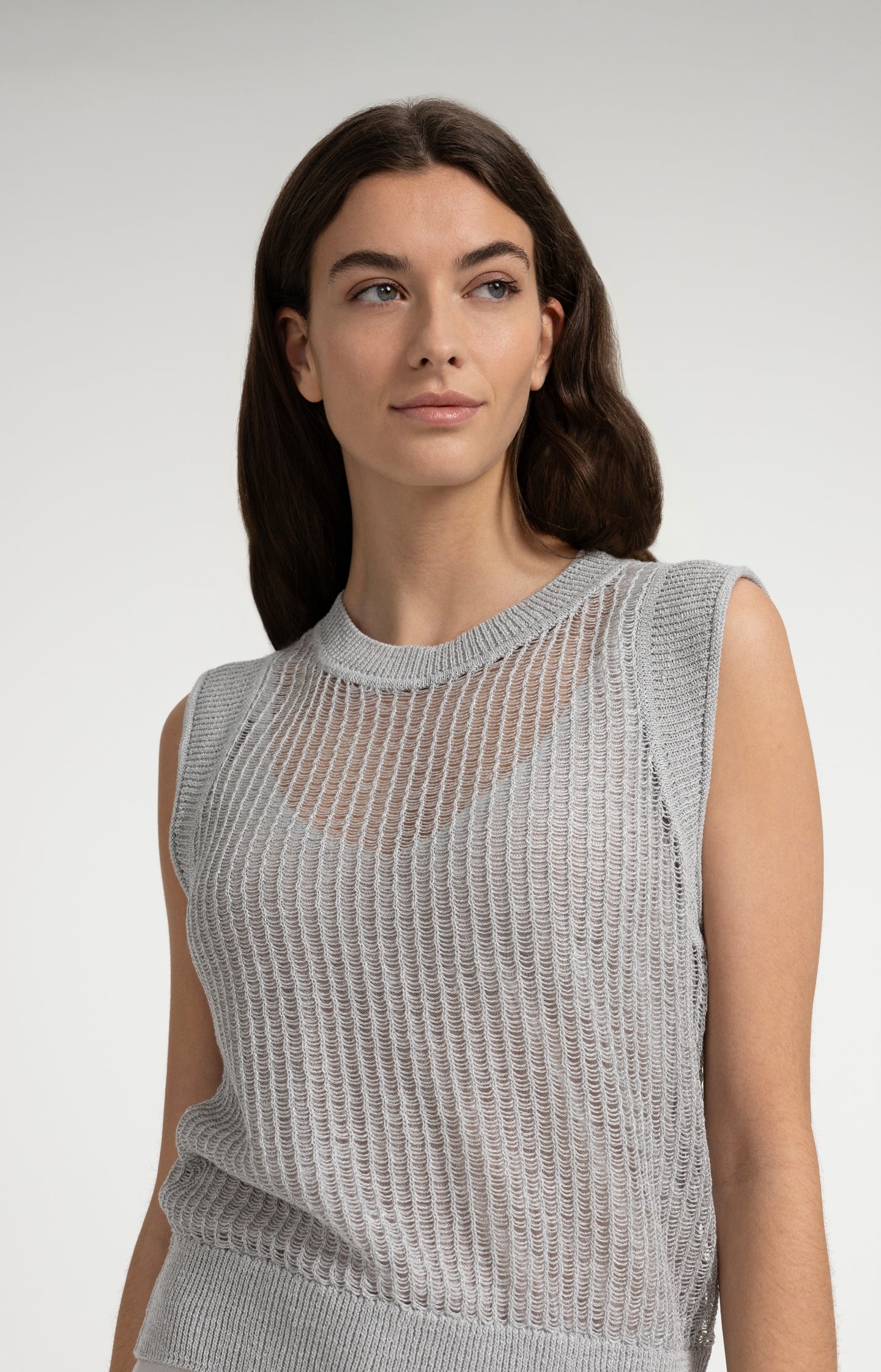 Open-knit top with matching underlayer
