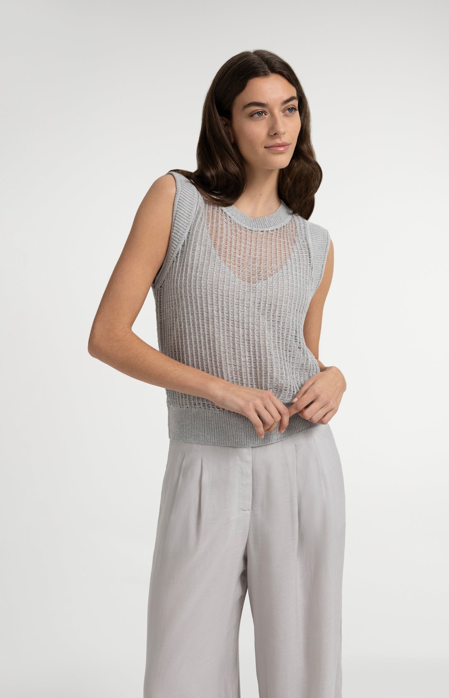 Open-knit top with matching underlayer
