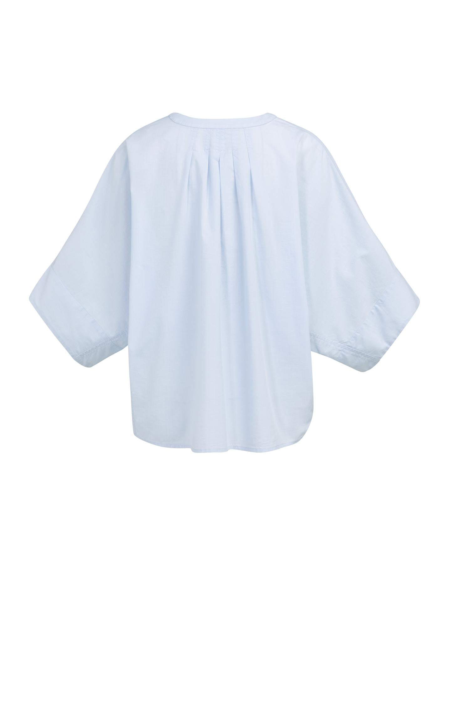 Oversized batwing blouse with pleats and wide sleeves