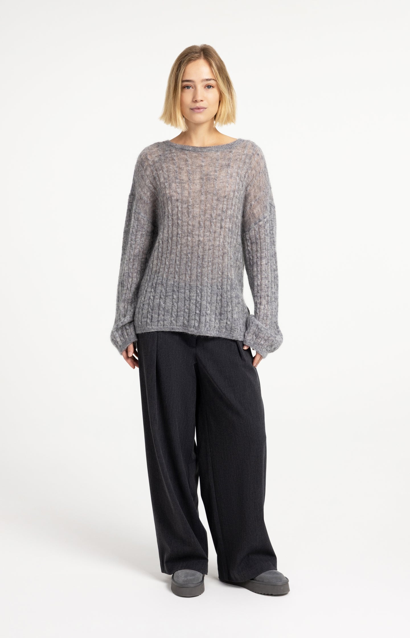 Oversized cable sweater with boat neckline